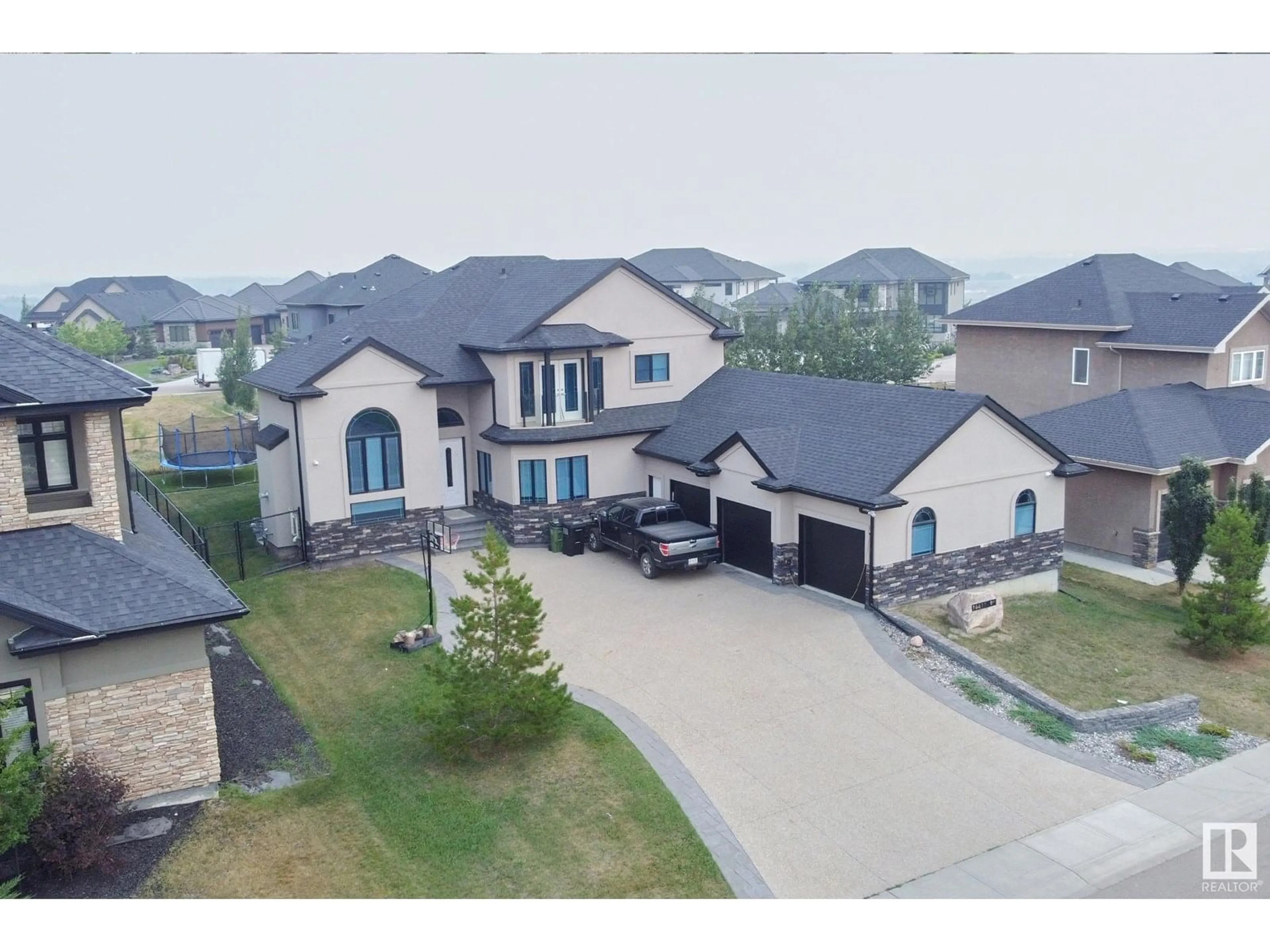 A pic from outside/outdoor area/front of a property/back of a property/a pic from drone, street for 16611 9 ST NE, Edmonton Alberta T5Y0P6