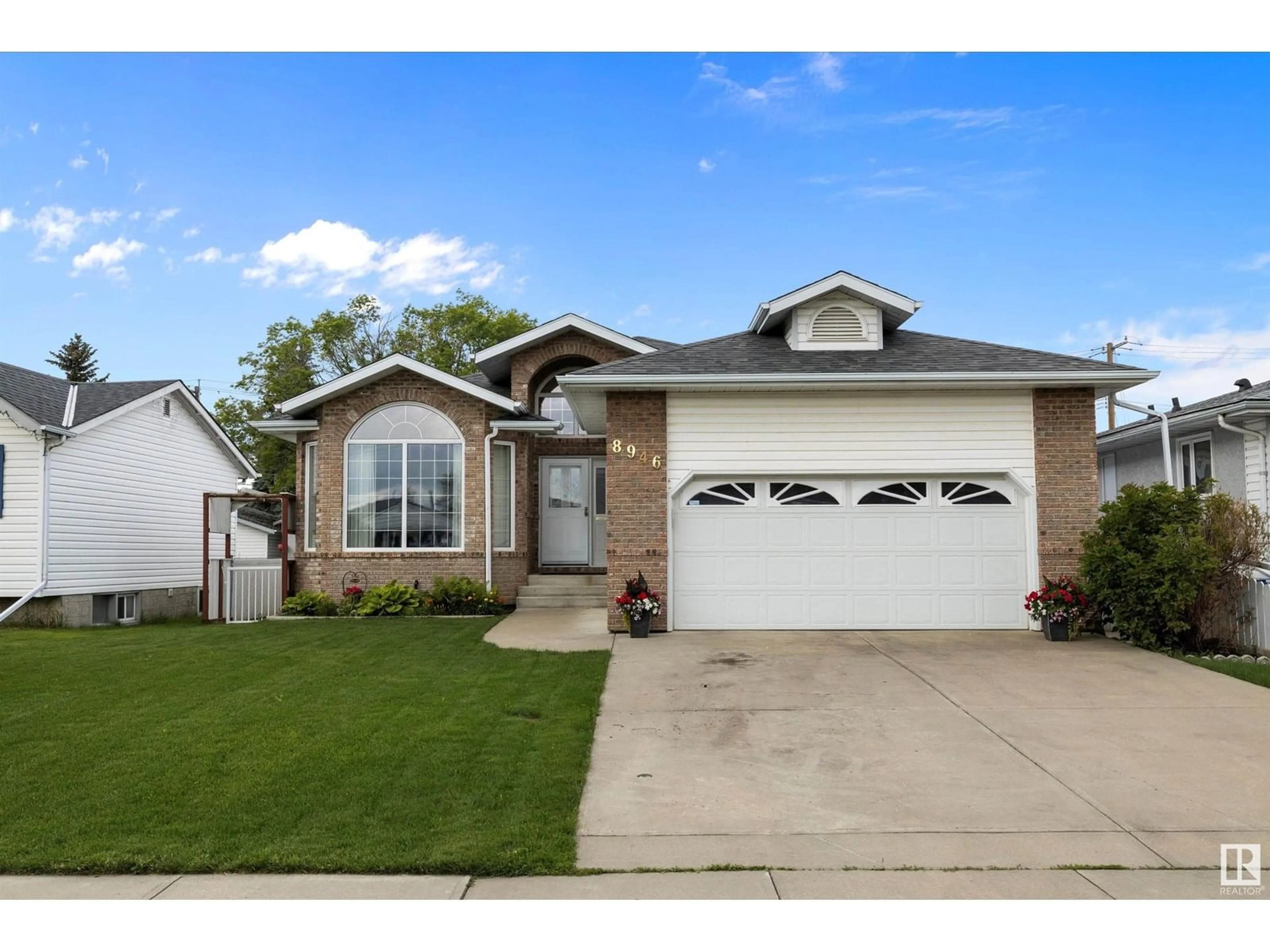 Home with vinyl exterior material, street for NW - 8946 154 ST, Edmonton Alberta T5R1S8