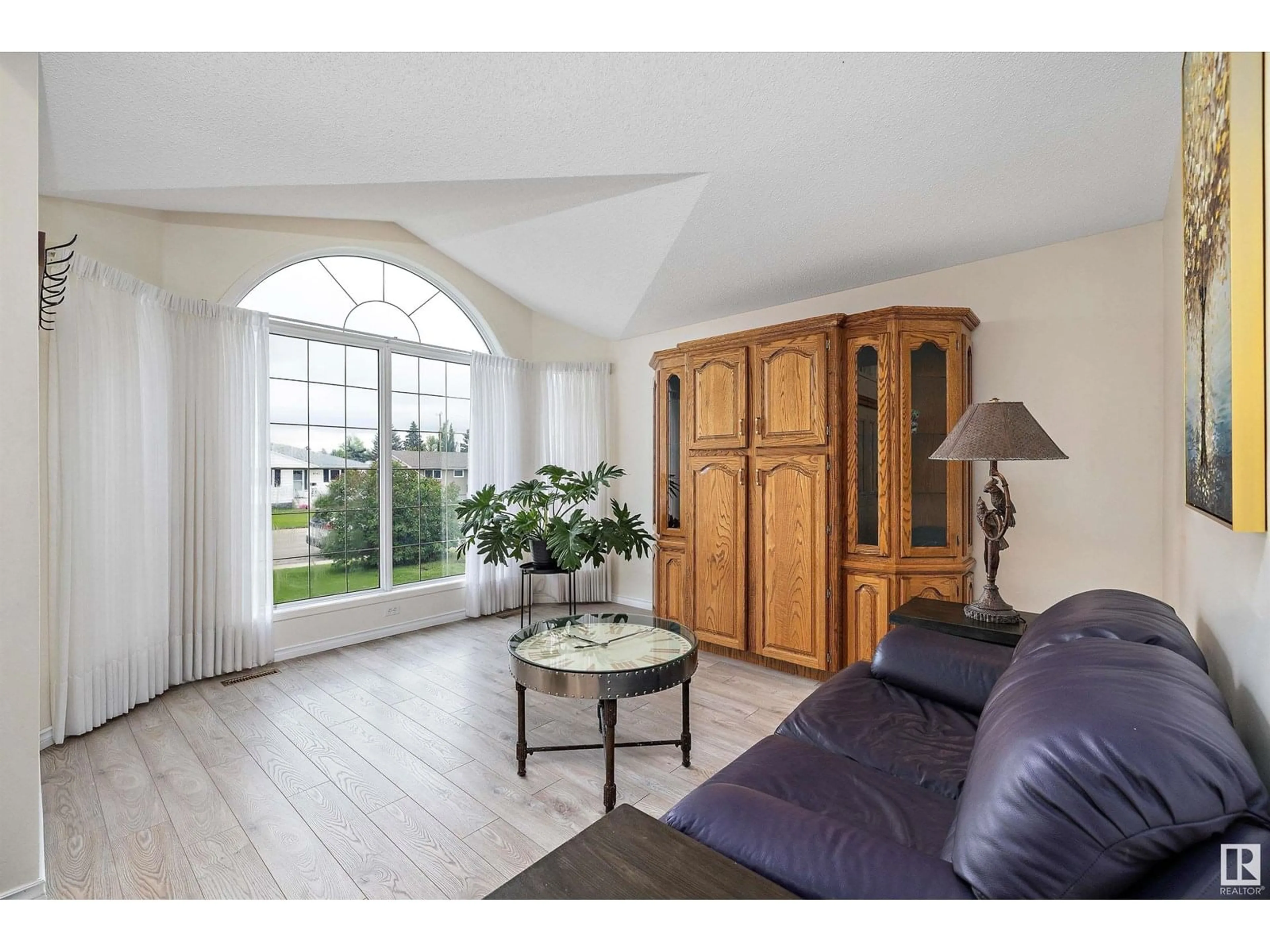 Living room with furniture, wood/laminate floor for NW - 8946 154 ST, Edmonton Alberta T5R1S8