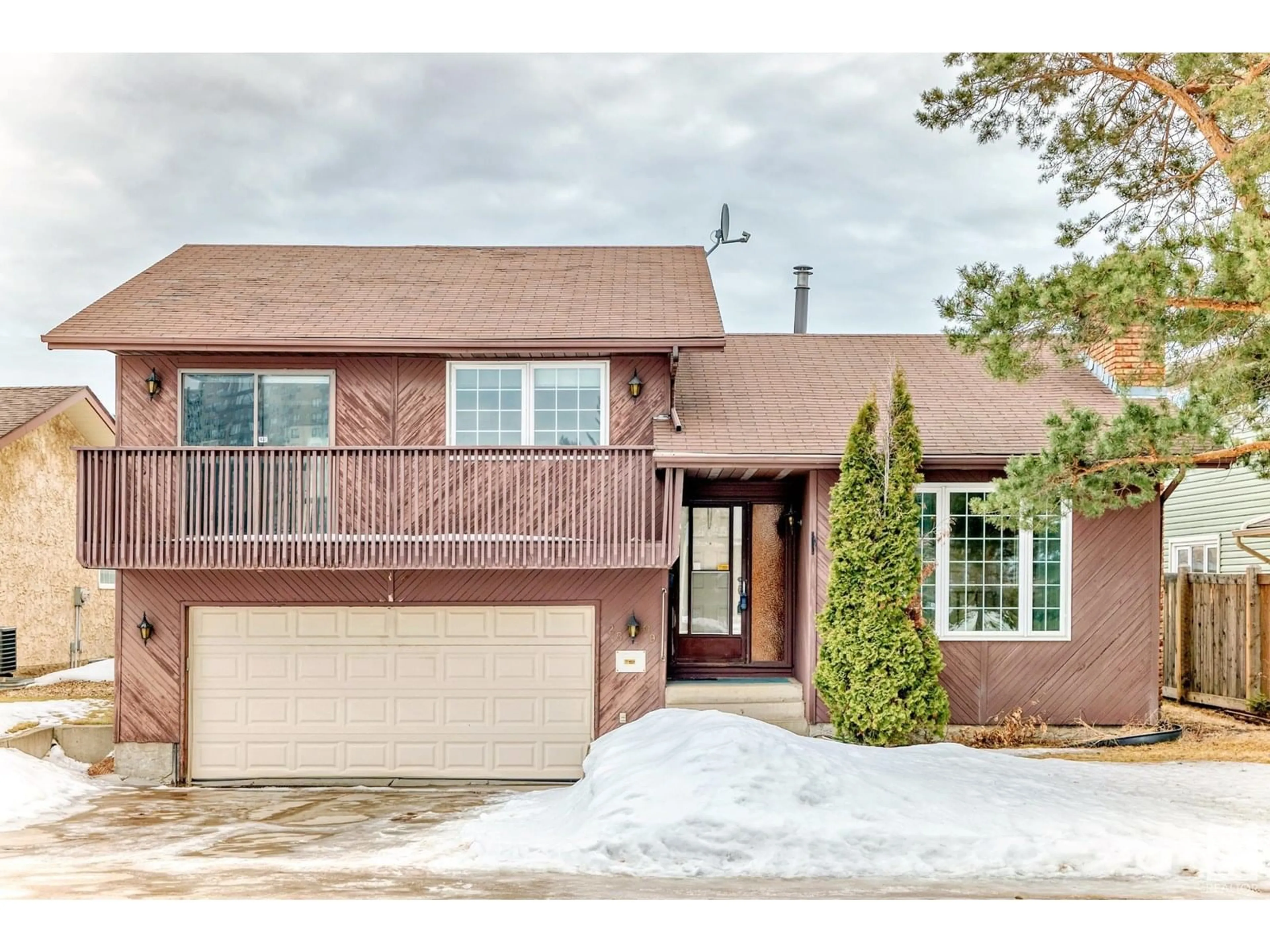Home with brick exterior material, street for NW - 2509 106A ST, Edmonton Alberta T6J4S1