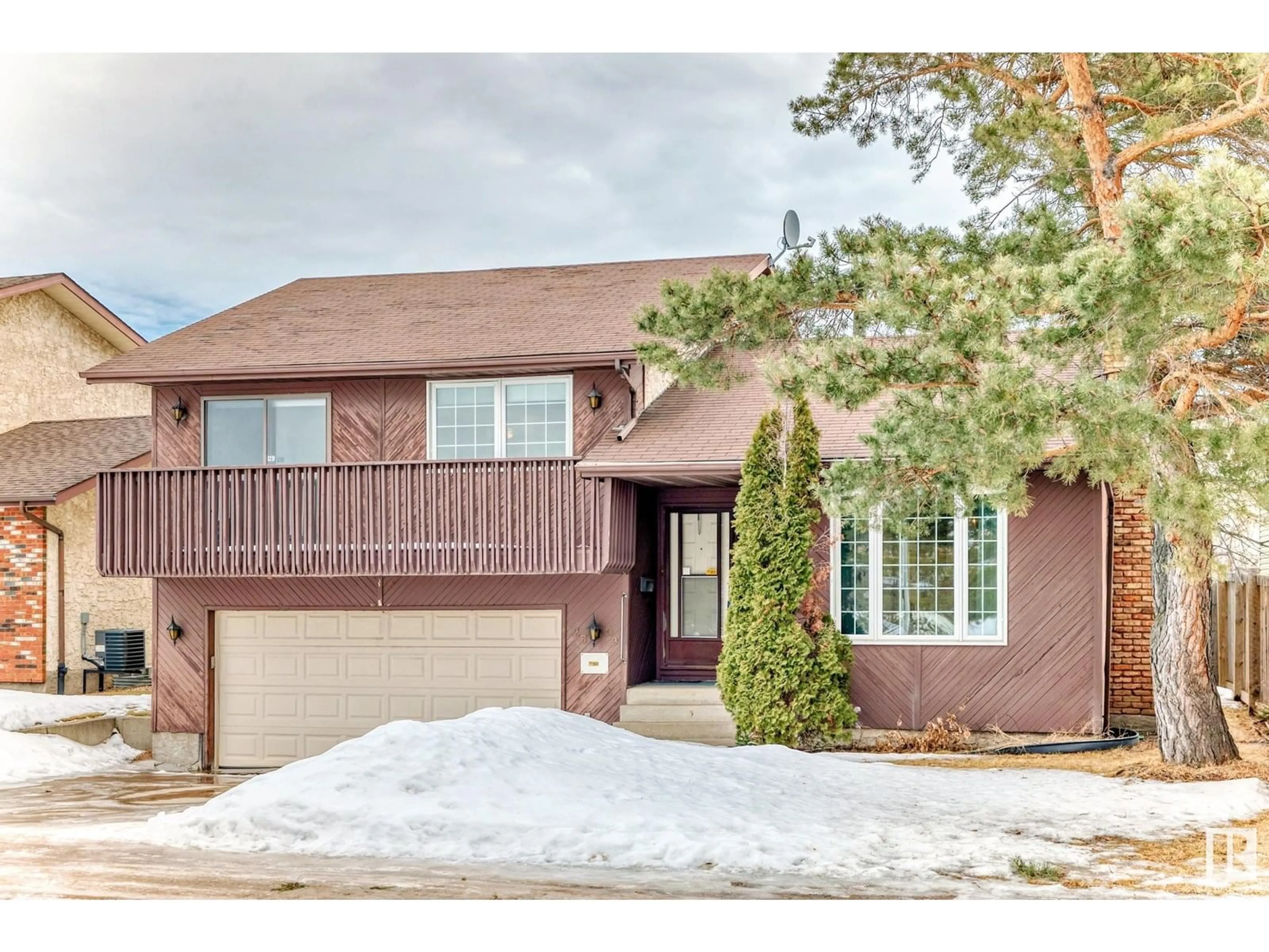Home with brick exterior material, street for NW - 2509 106A ST, Edmonton Alberta T6J4S1