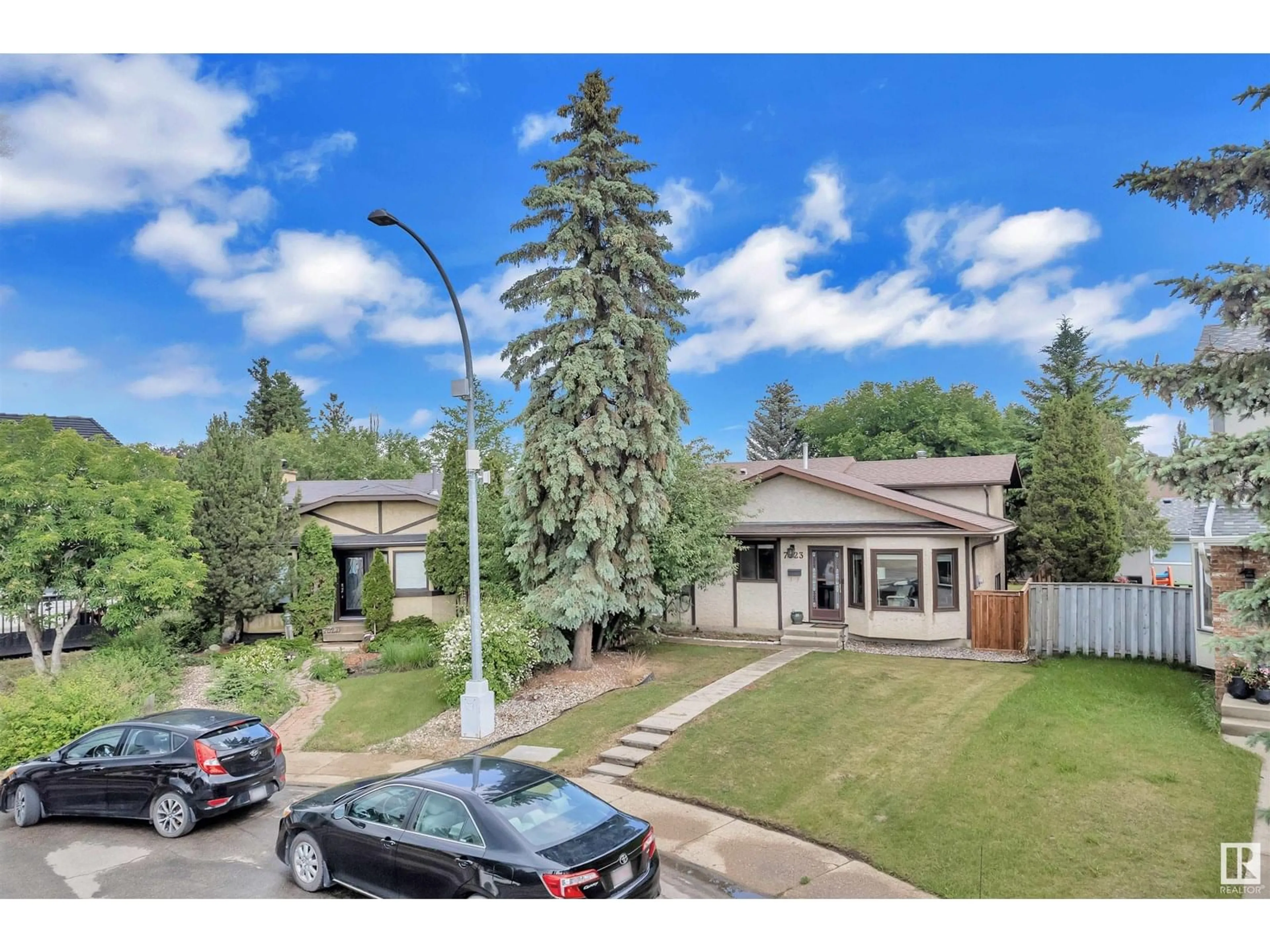 A pic from outside/outdoor area/front of a property/back of a property/a pic from drone, street for NW - 7023 189 ST, Edmonton Alberta T5T5E3