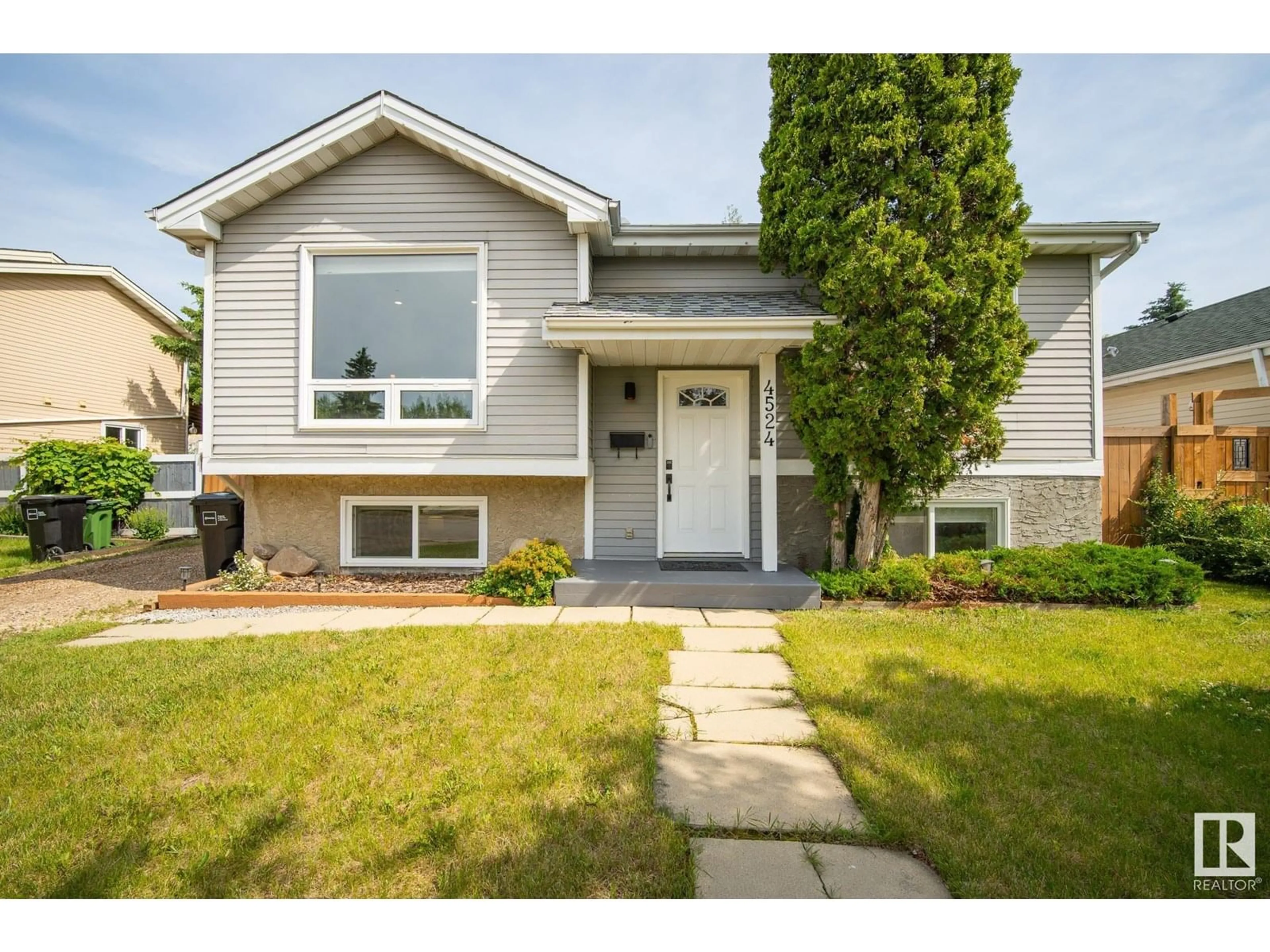 Home with vinyl exterior material, street for 4524 35 AV, Edmonton Alberta T6L3P9