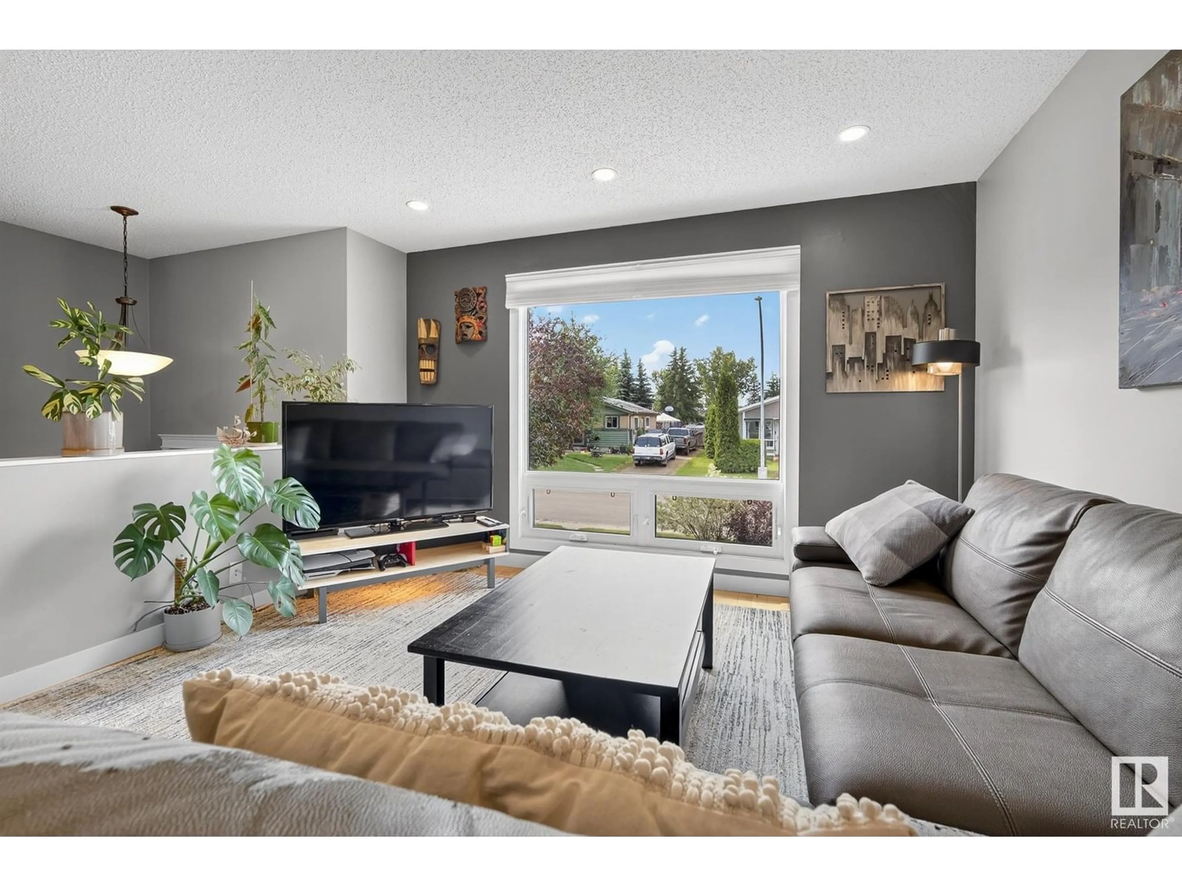 Living room with furniture, unknown for 4524 35 AV, Edmonton Alberta T6L3P9