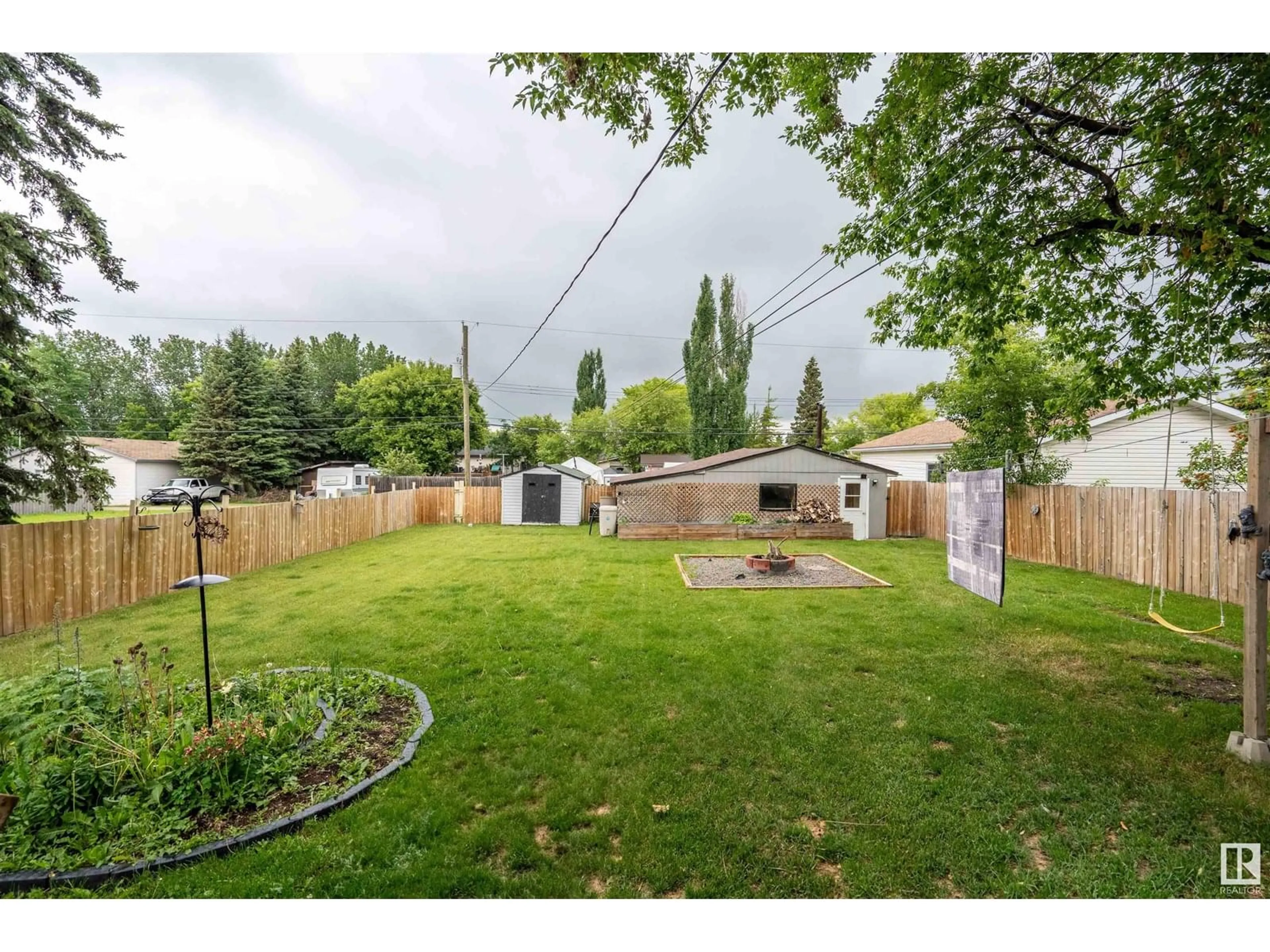 A pic from outside/outdoor area/front of a property/back of a property/a pic from drone, mountain view for 5710 52 AV, Cold Lake Alberta T9M2C4