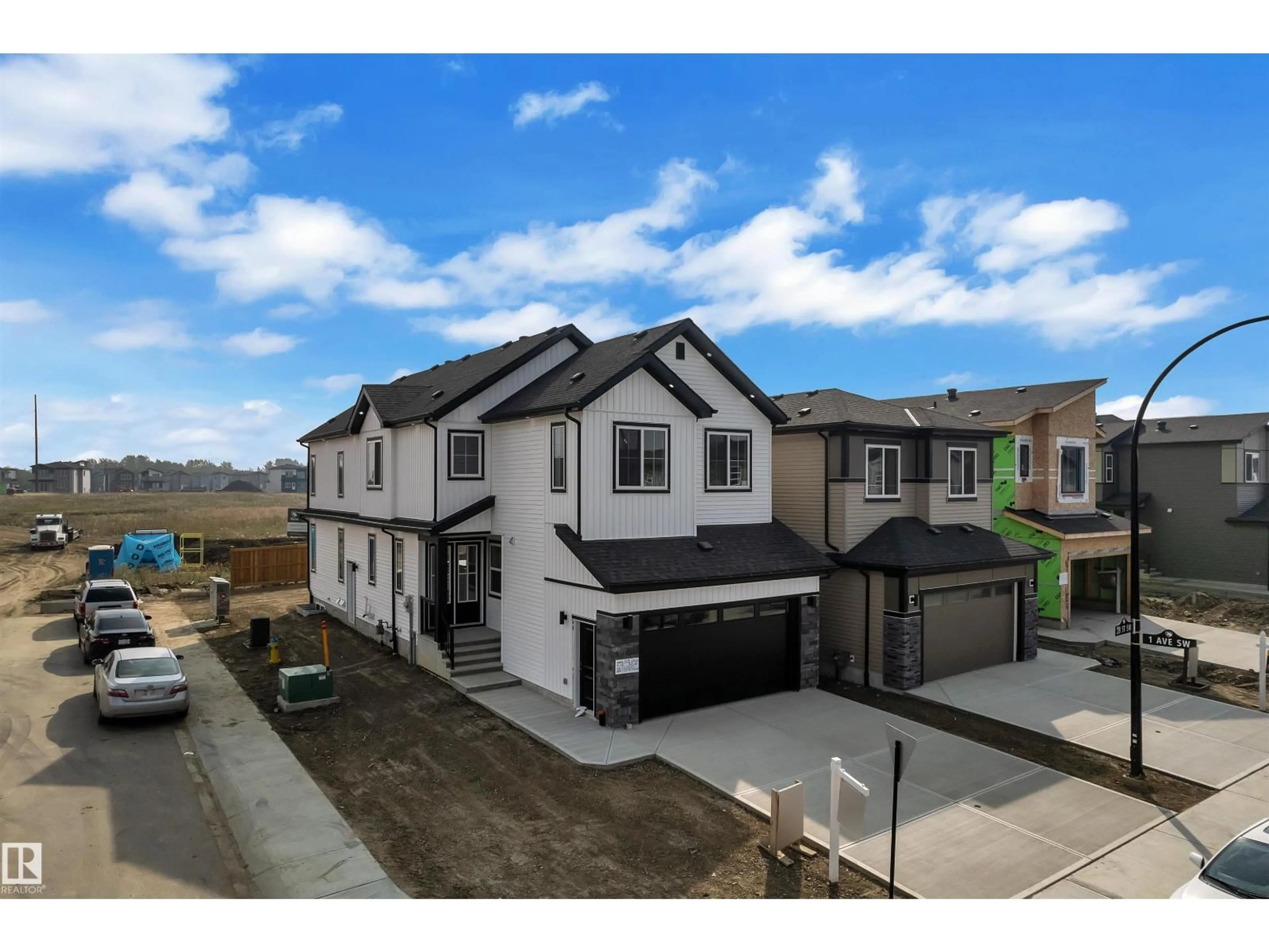 A pic from outside/outdoor area/front of a property/back of a property/a pic from drone, street for SW - 103 28 ST, Edmonton Alberta T6X3E4