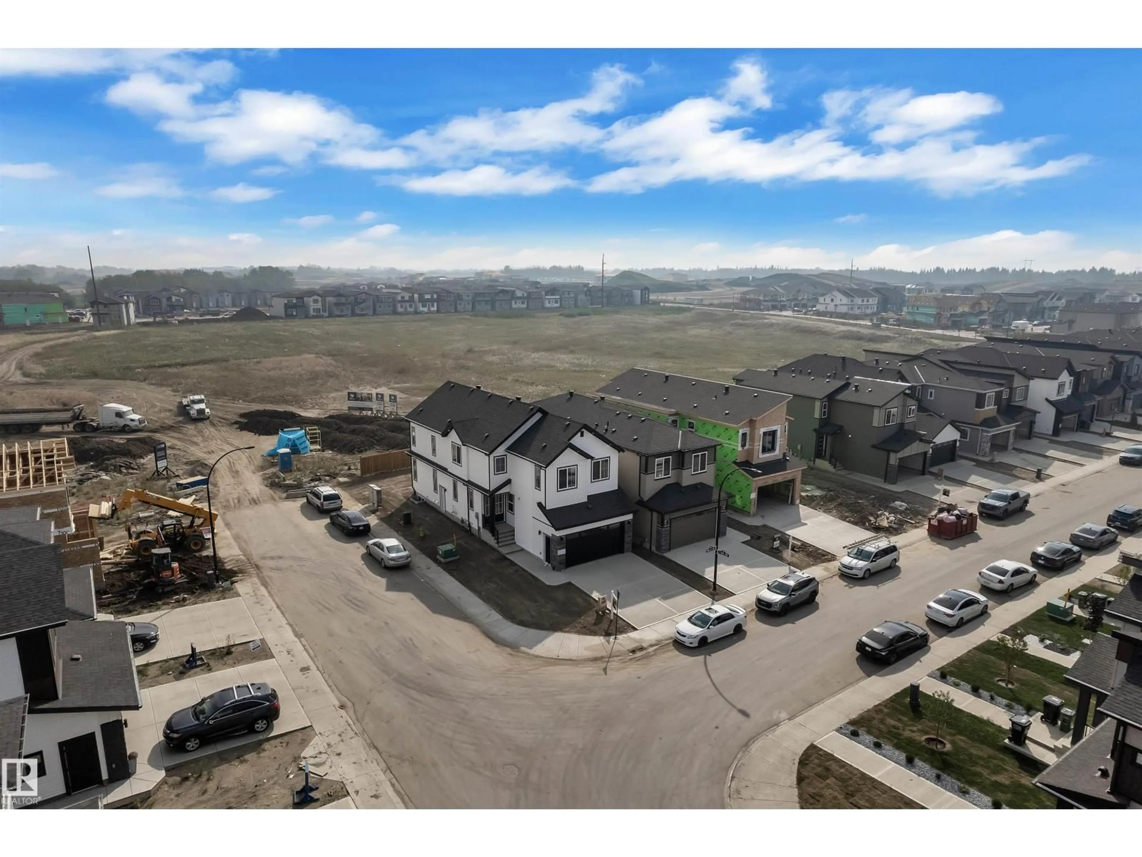 A pic from outside/outdoor area/front of a property/back of a property/a pic from drone, mountain view for SW - 103 28 ST, Edmonton Alberta T6X3E4