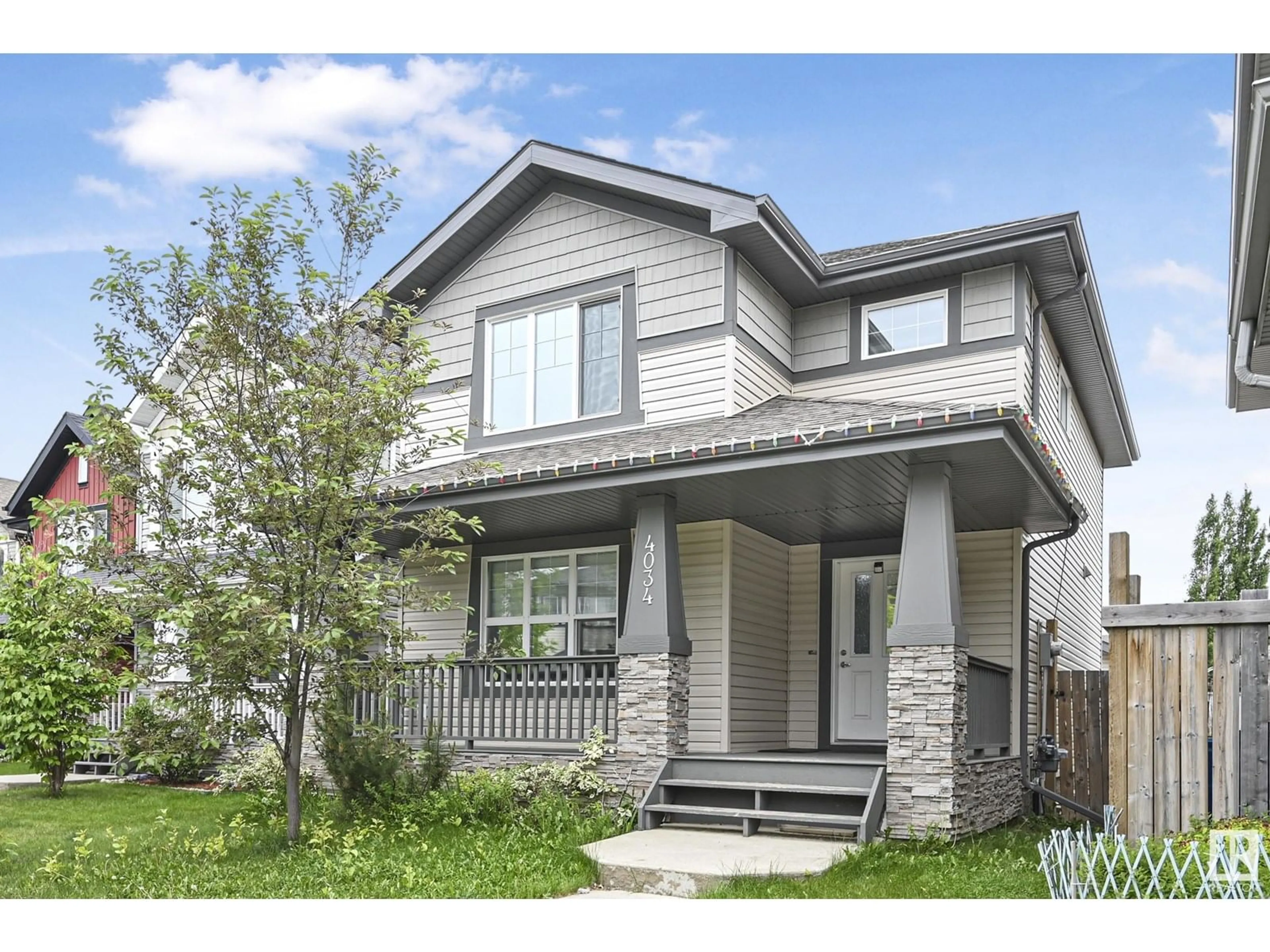 Home with vinyl exterior material, street for 4034 ALEXANDER WY, Edmonton Alberta T6W2C5