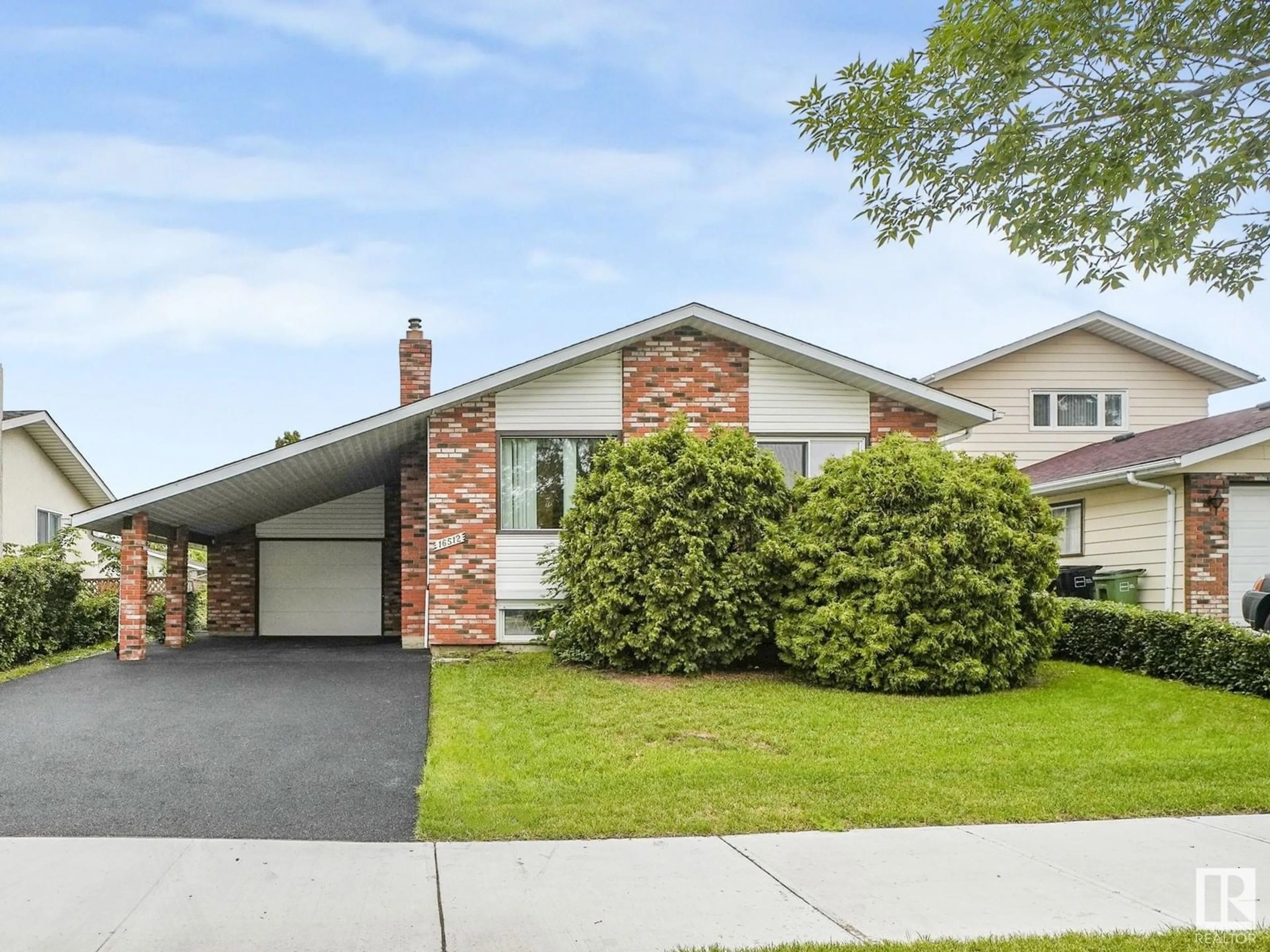 Home with brick exterior material, street for NW - 16512 109 ST, Edmonton Alberta T5X1W9