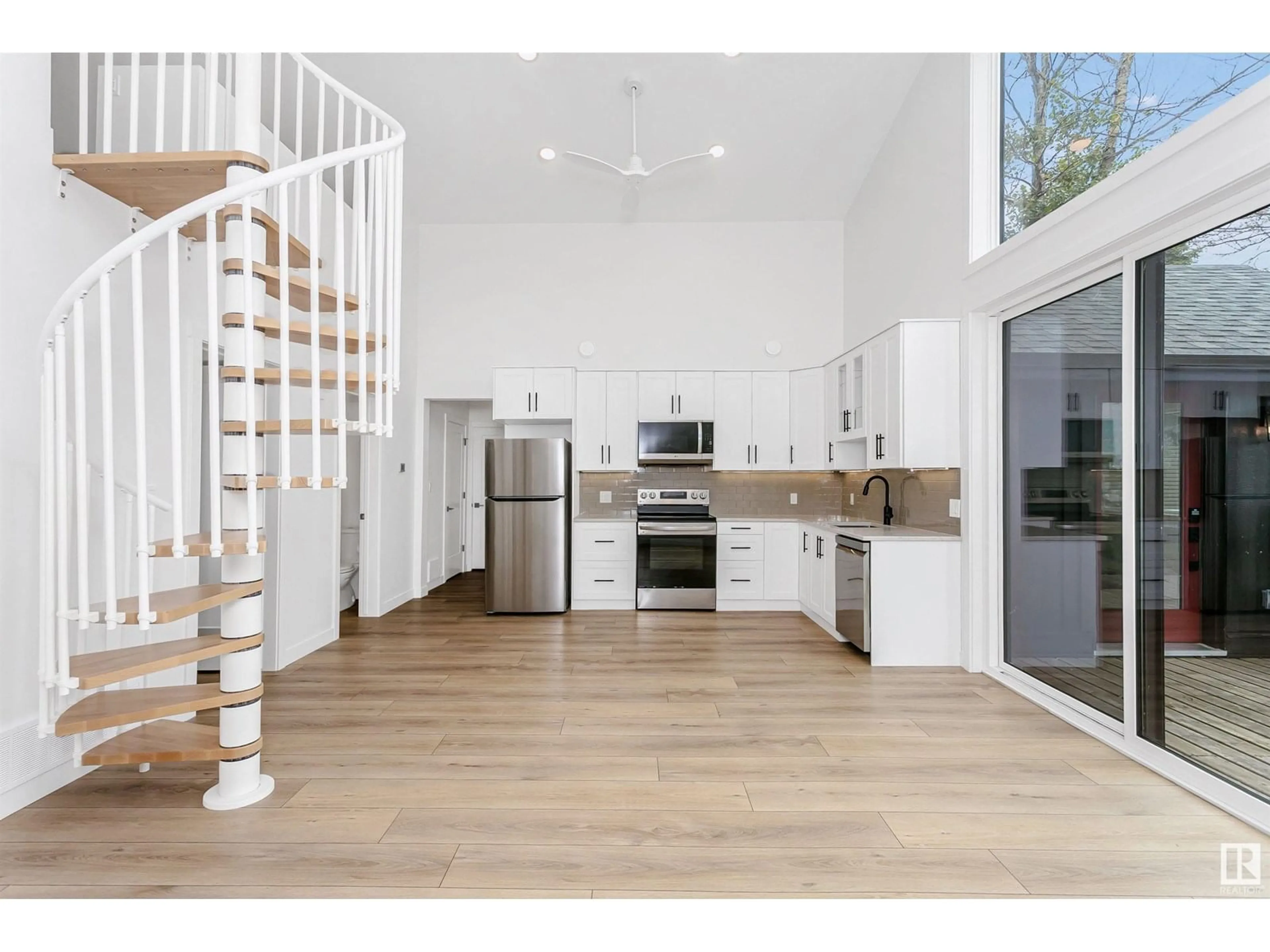 Open concept kitchen, wood/laminate floor for 24 STE. ANNE TR, Rural Lac Ste. Anne County Alberta T0E1A1