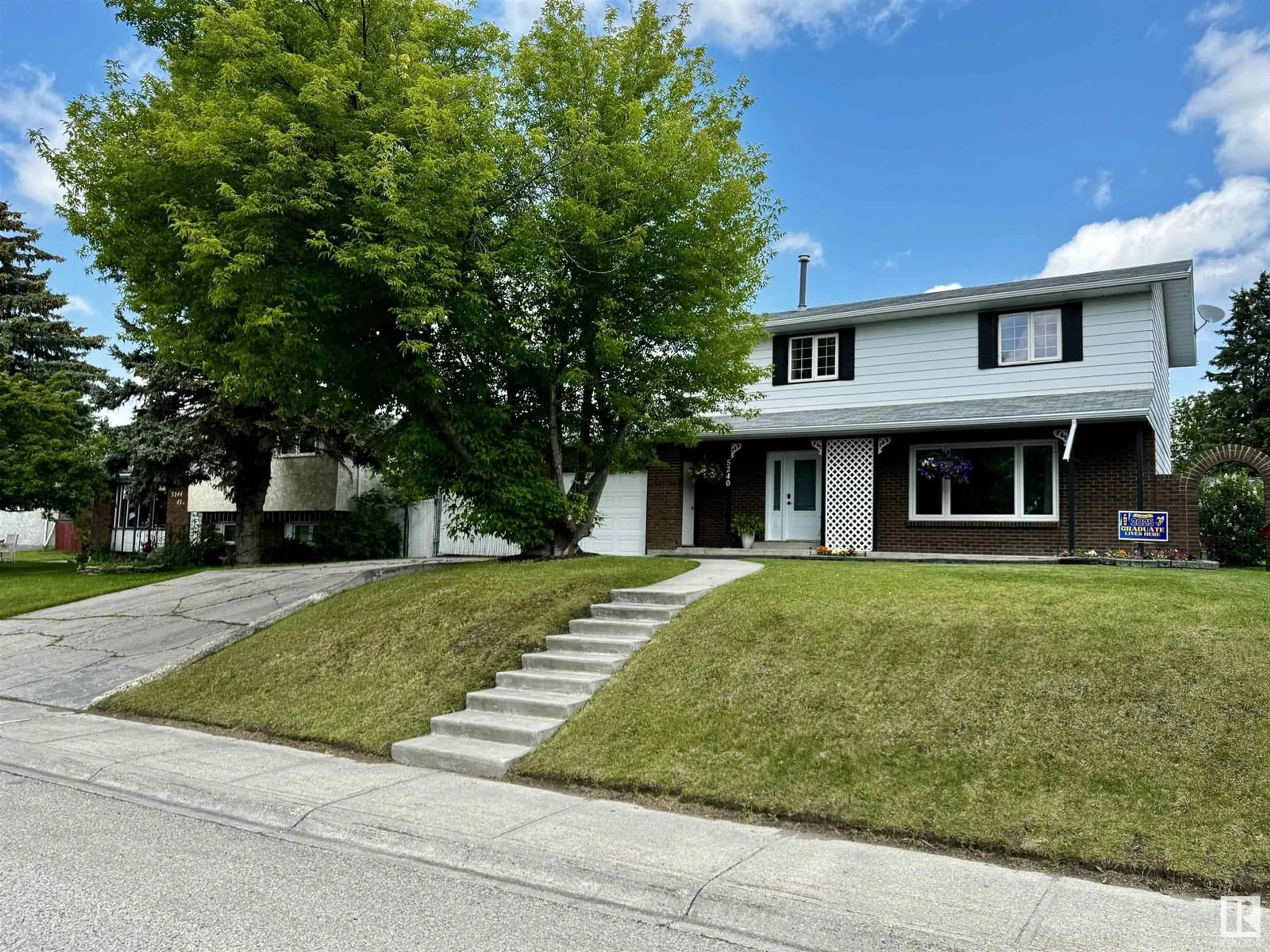 Home with vinyl exterior material, street for 5240 45 AV, Drayton Valley Alberta T7A1K6