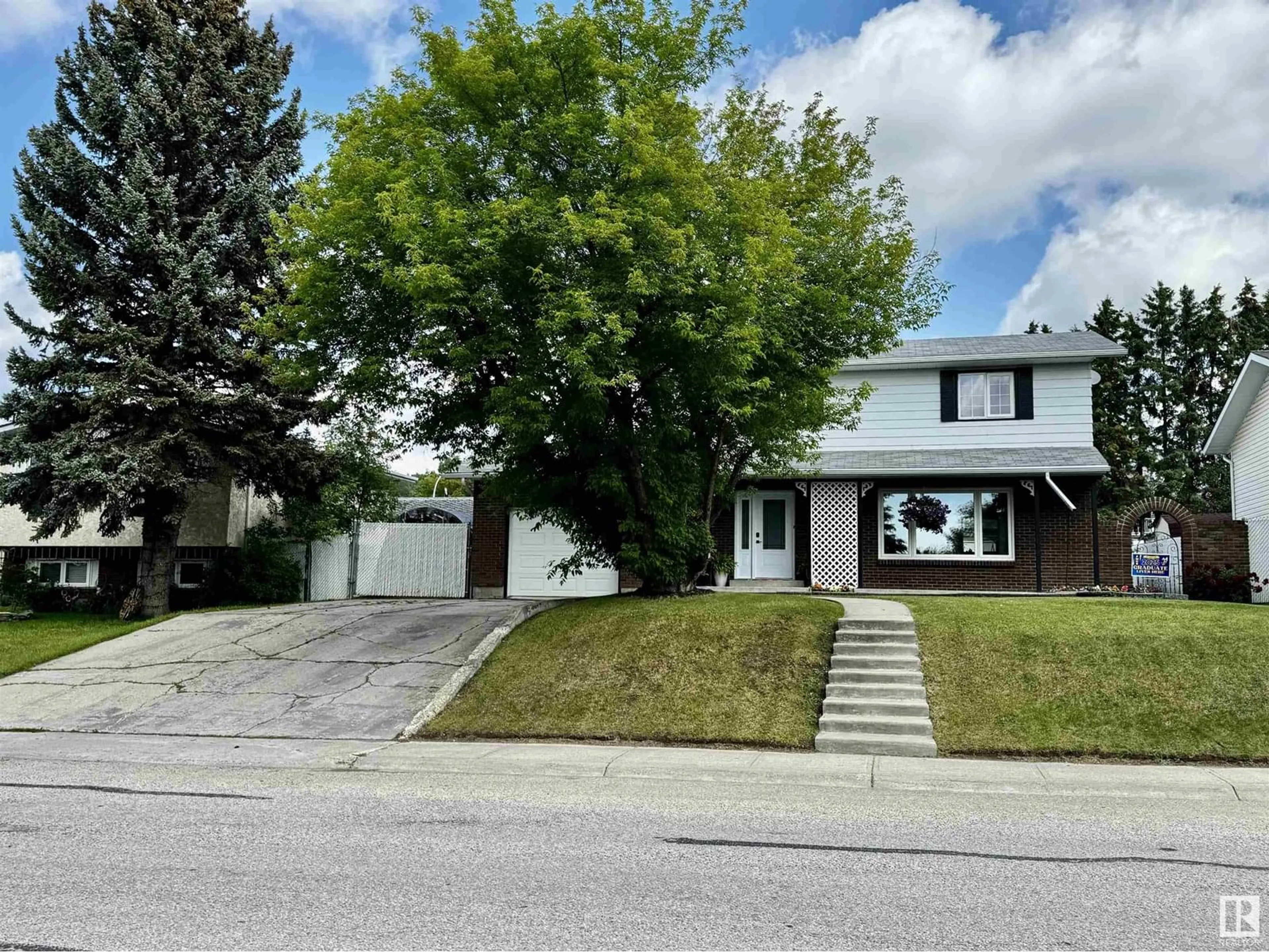 Home with vinyl exterior material, street for 5240 45 AV, Drayton Valley Alberta T7A1K6