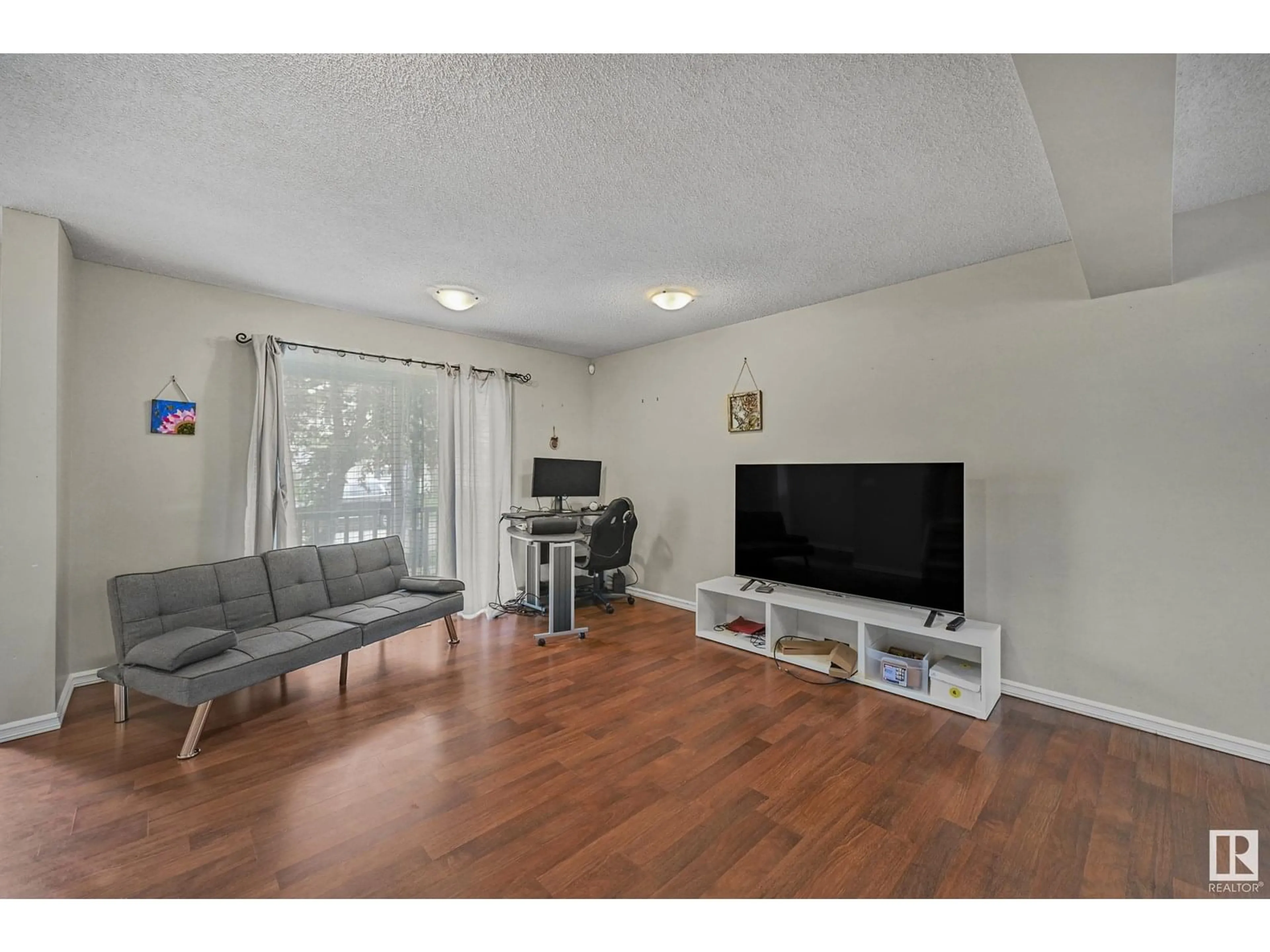 Living room with furniture, unknown for 16411 57 ST, Edmonton Alberta T5Y0A2