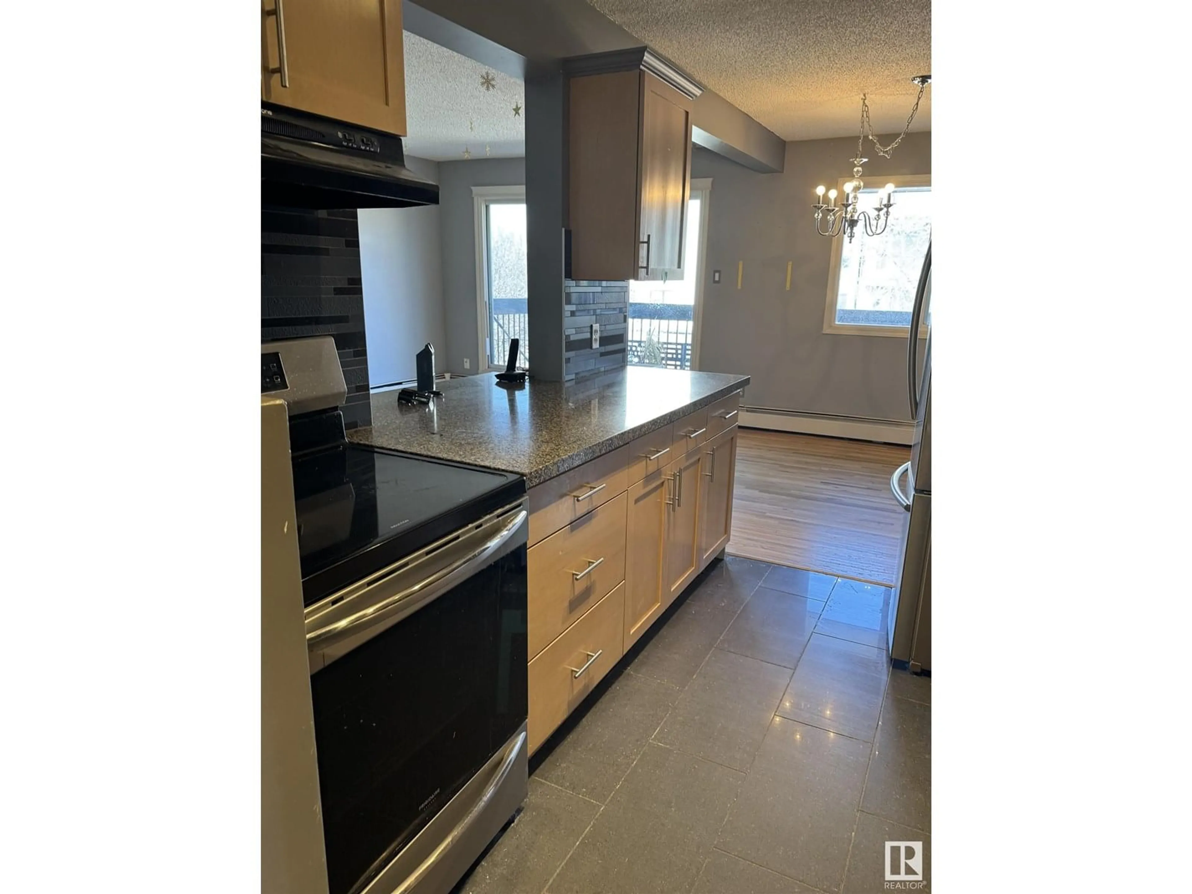 Open concept kitchen, ceramic/tile floor for 425 11217 103 AV, Edmonton Alberta T5K2V9