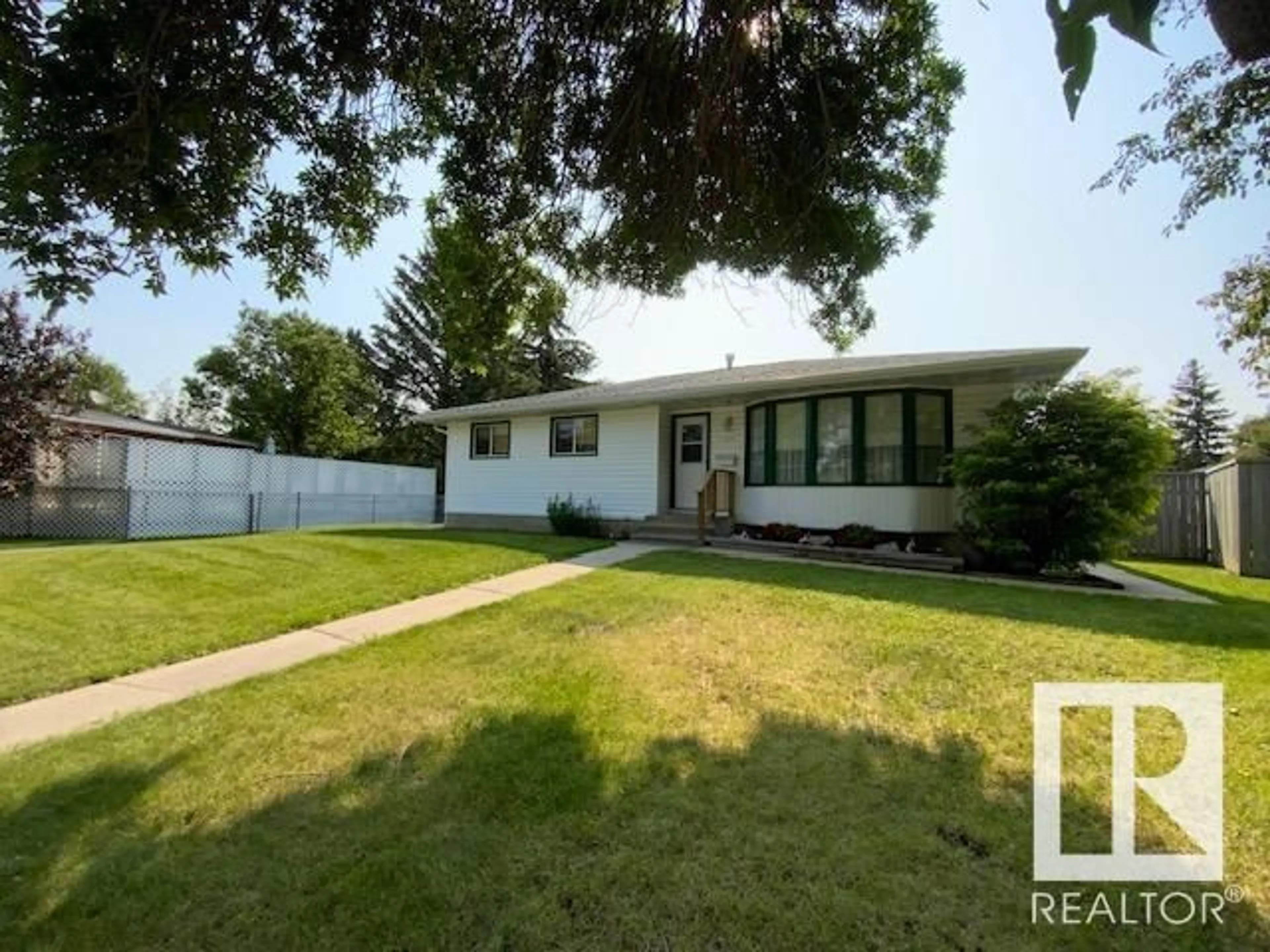 Home with vinyl exterior material, street for 133 ELM CR, Wetaskiwin Alberta T9A2C7