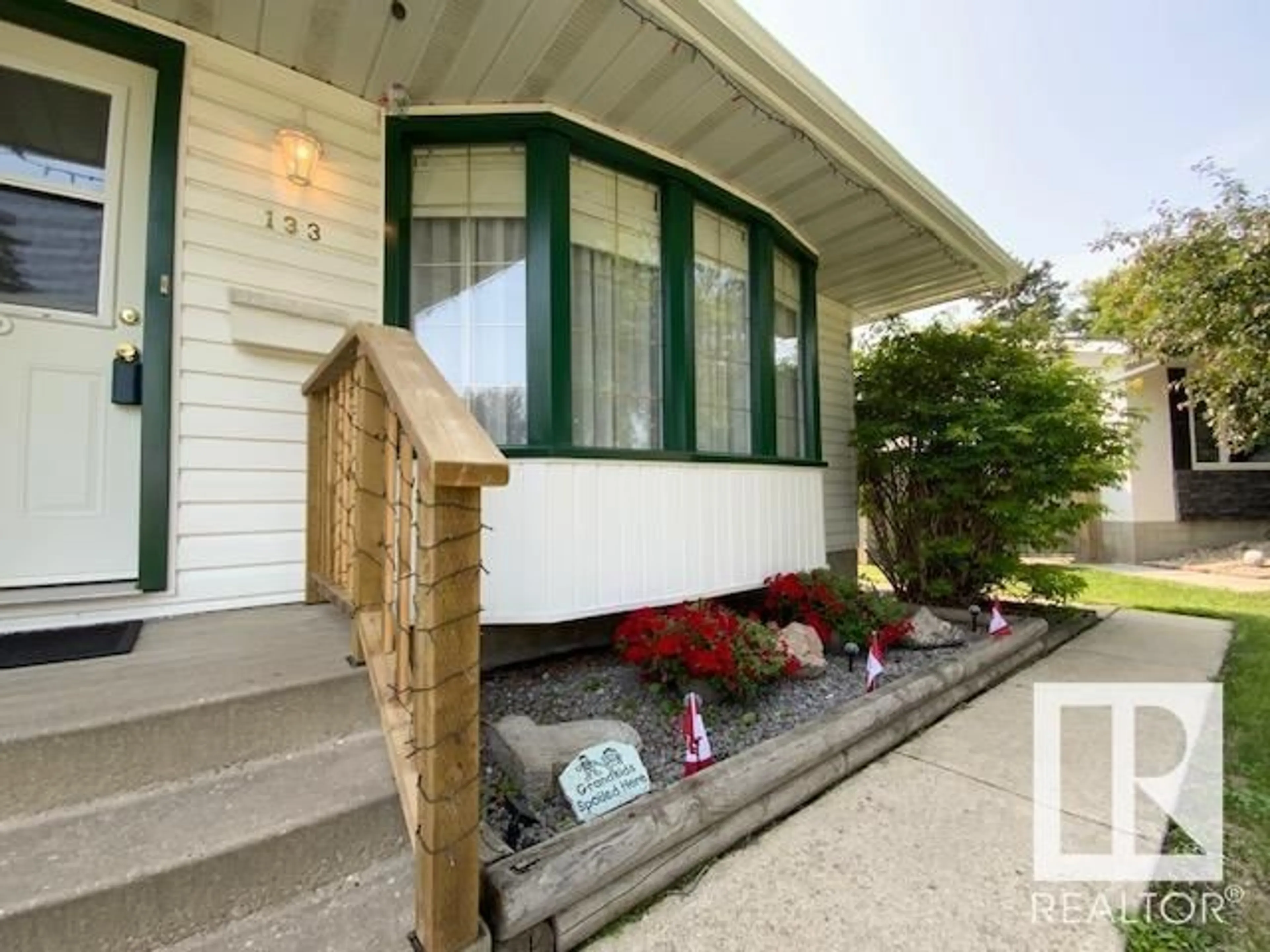 Home with vinyl exterior material, street for 133 ELM CR, Wetaskiwin Alberta T9A2C7
