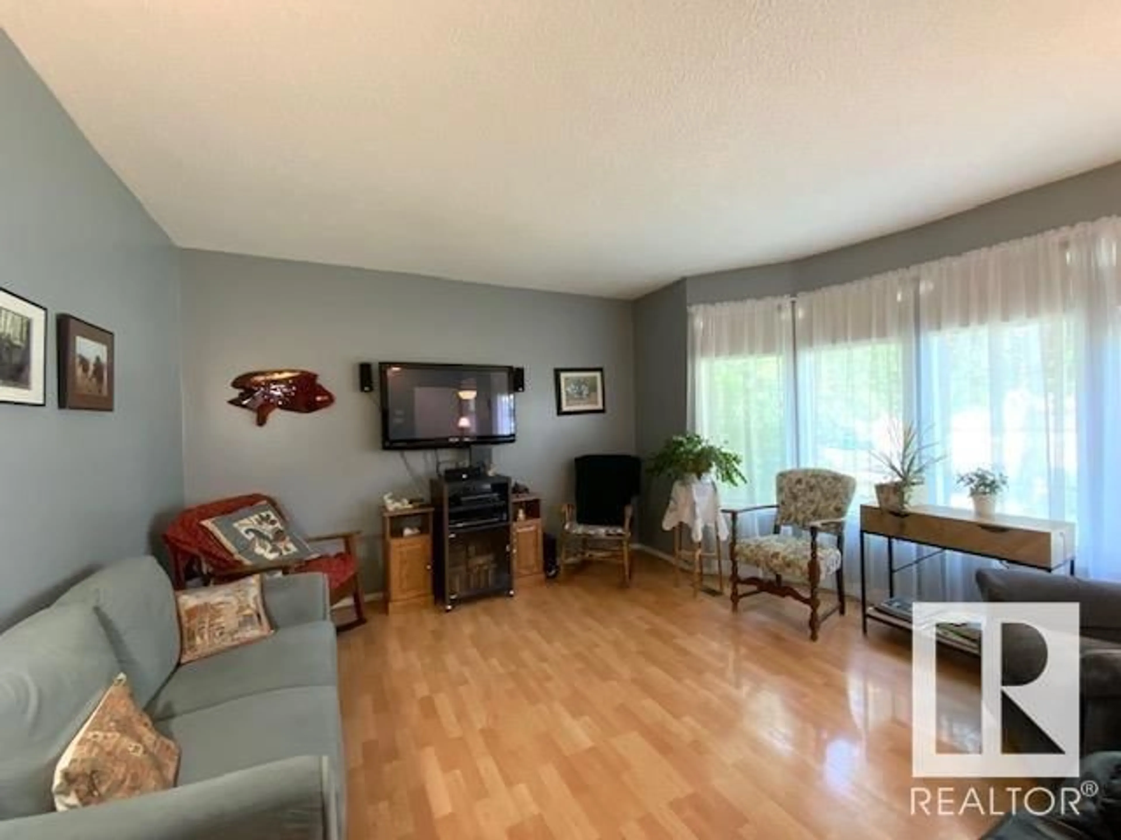 Living room with furniture, unknown for 133 ELM CR, Wetaskiwin Alberta T9A2C7