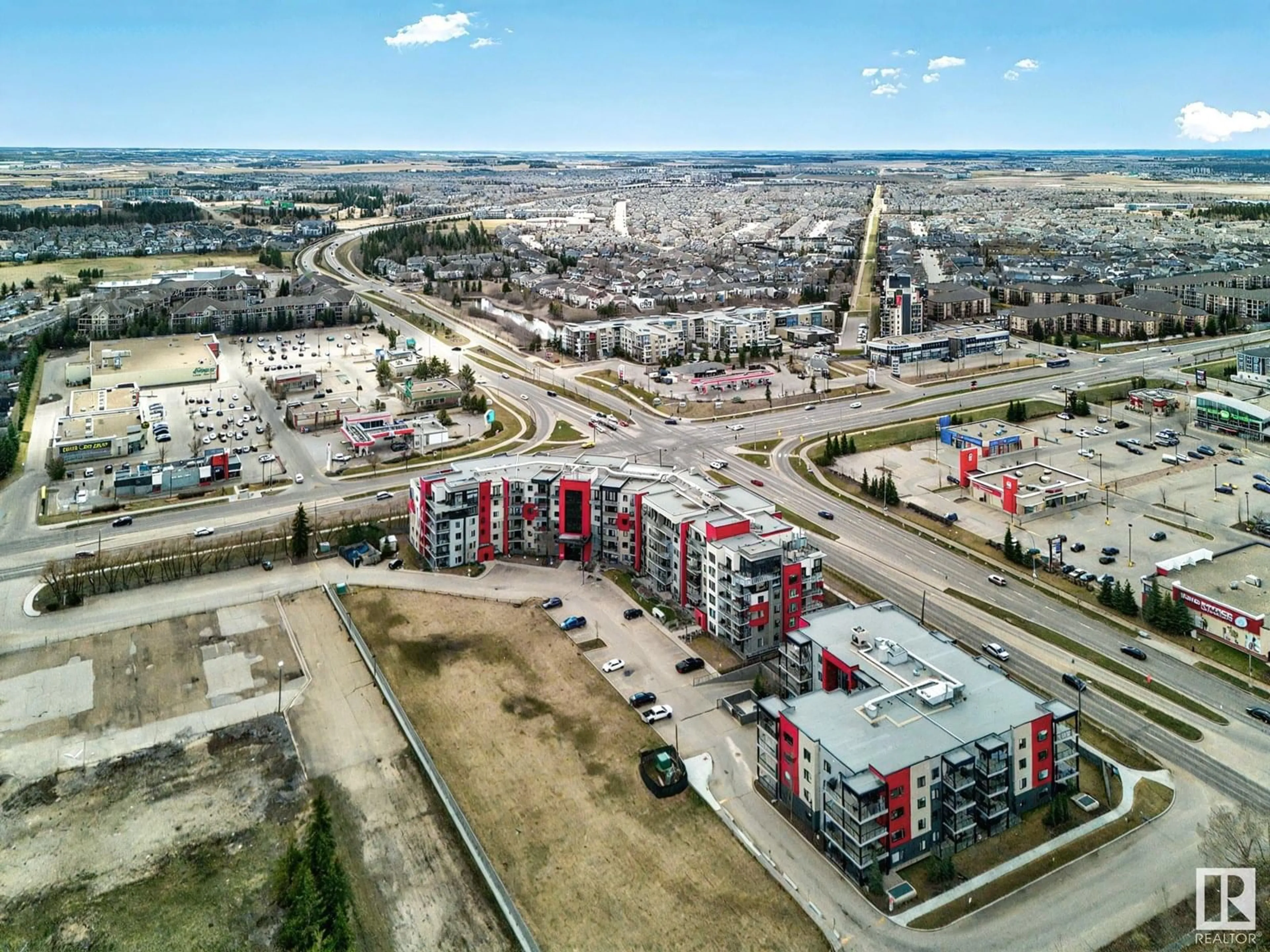 A pic from outside/outdoor area/front of a property/back of a property/a pic from drone, unknown for 11074 - 230 ELLERSLIE RD, Edmonton Alberta T6W2C2