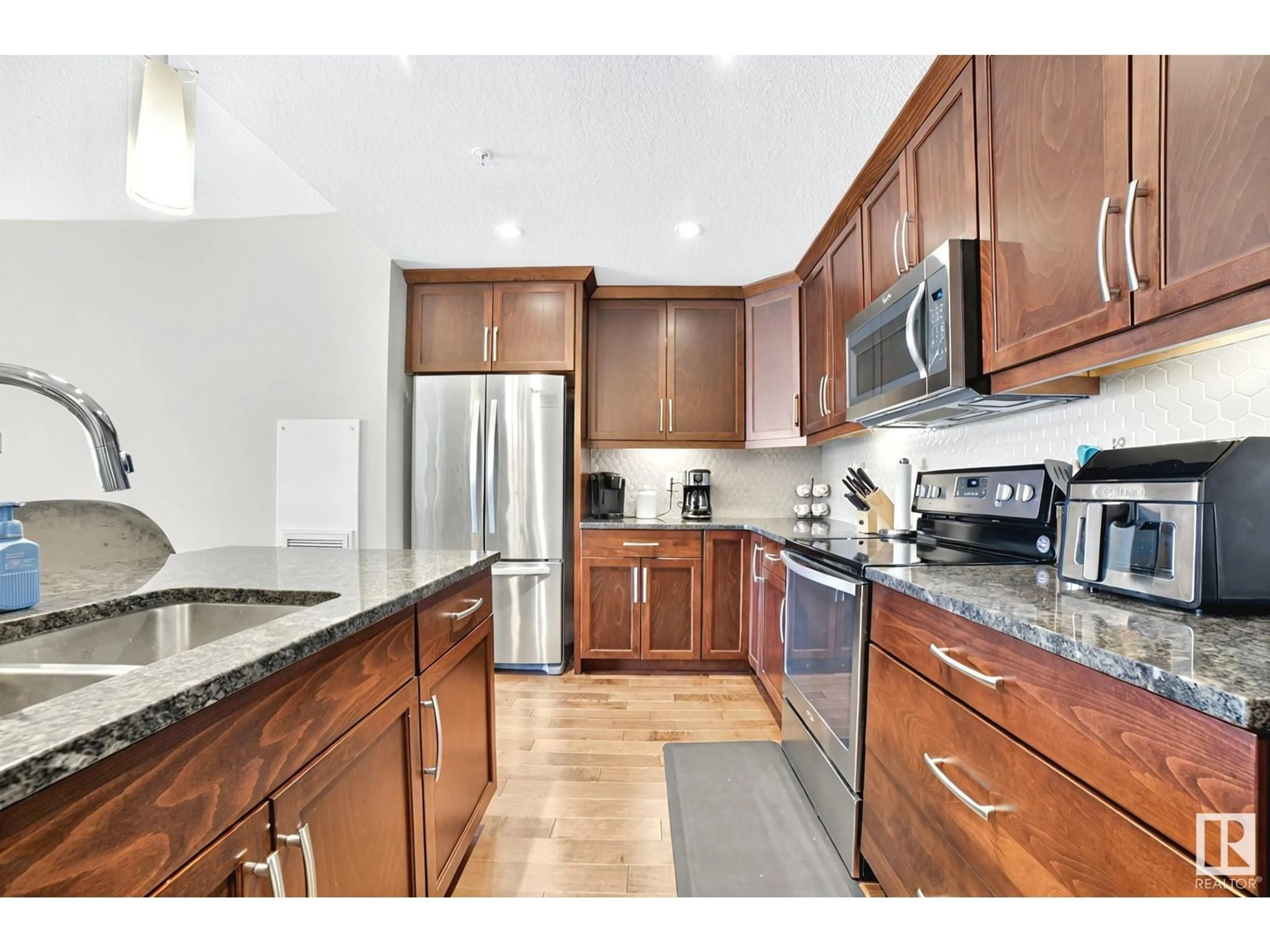Open concept kitchen, ceramic/tile floor for 11074 - 230 ELLERSLIE RD, Edmonton Alberta T6W2C2