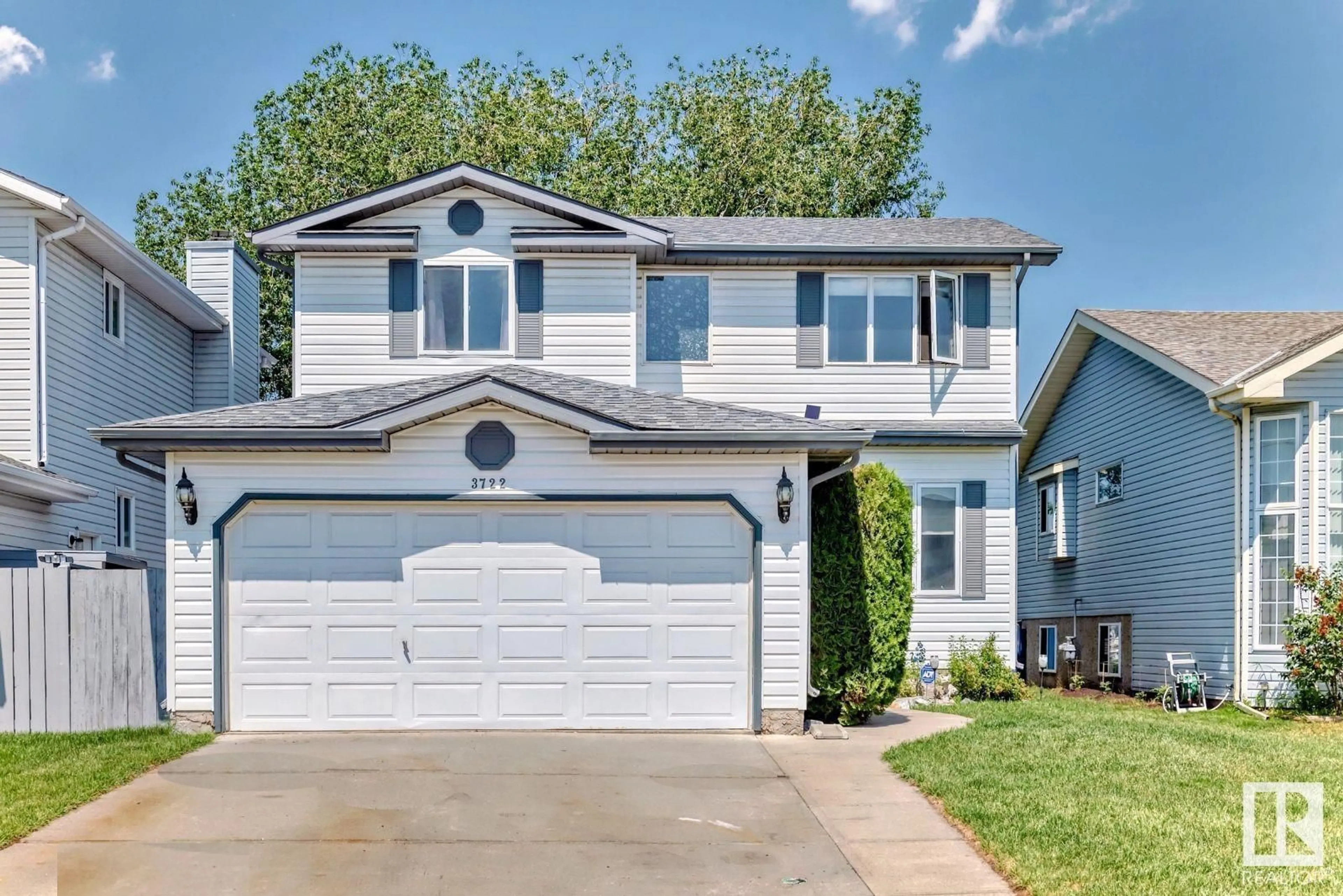 Home with vinyl exterior material, street for 3722 131A AV, Edmonton Alberta T5A4Y8