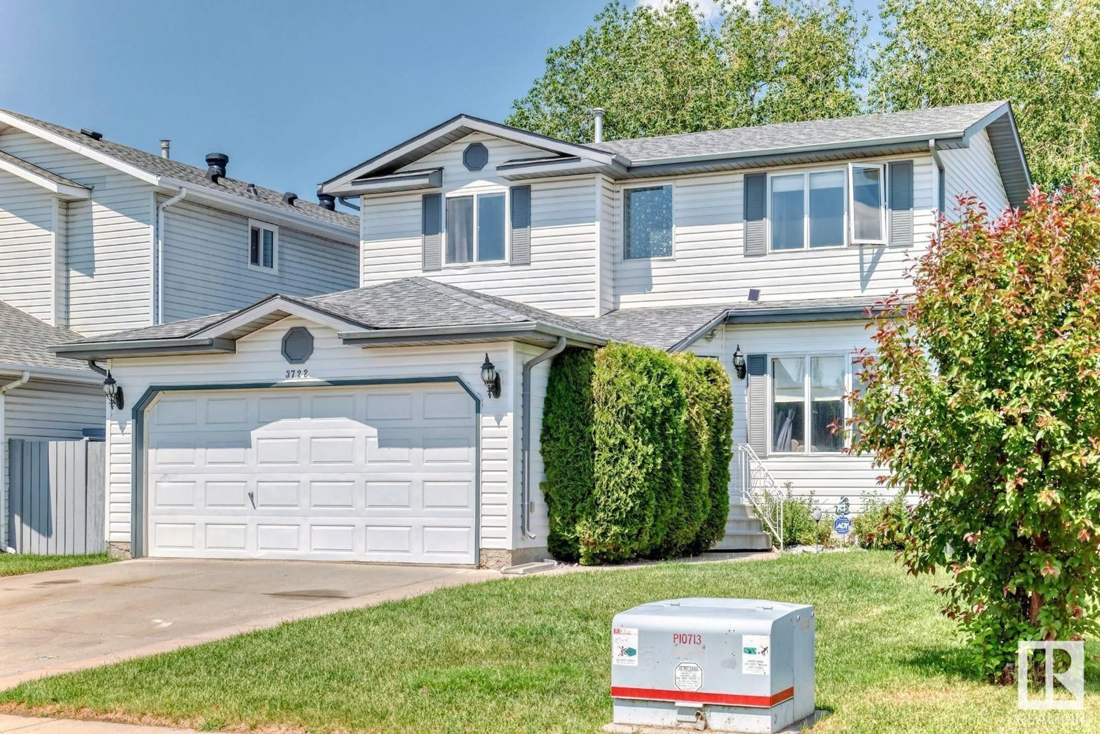 Home with vinyl exterior material, street for 3722 131A AV, Edmonton Alberta T5A4Y8