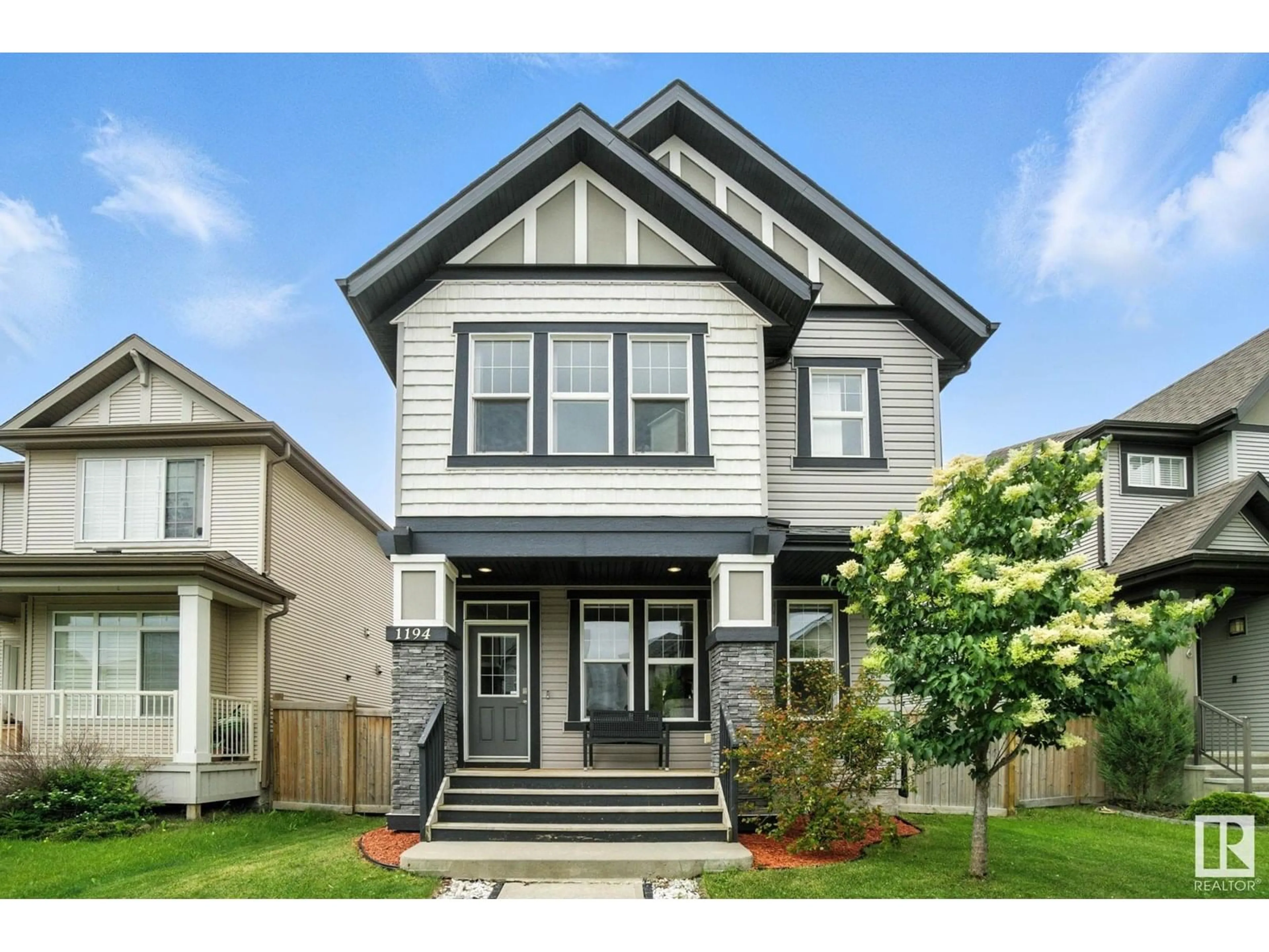Home with vinyl exterior material, street for 1194 MCCONACHIE BV, Edmonton Alberta T5Y0V1