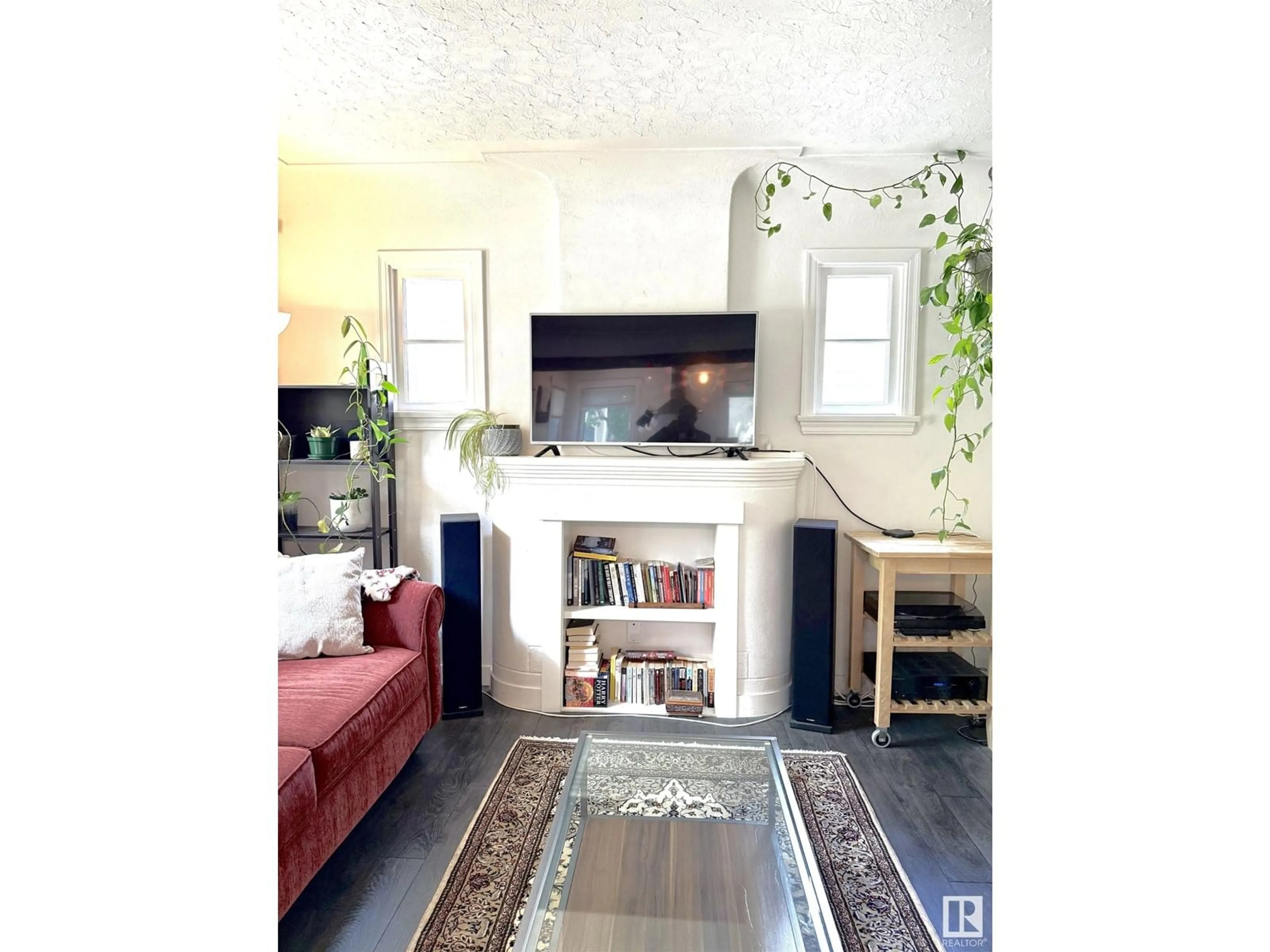 Living room with furniture, unknown for 10915 67 AV, Edmonton Alberta T6H2A5