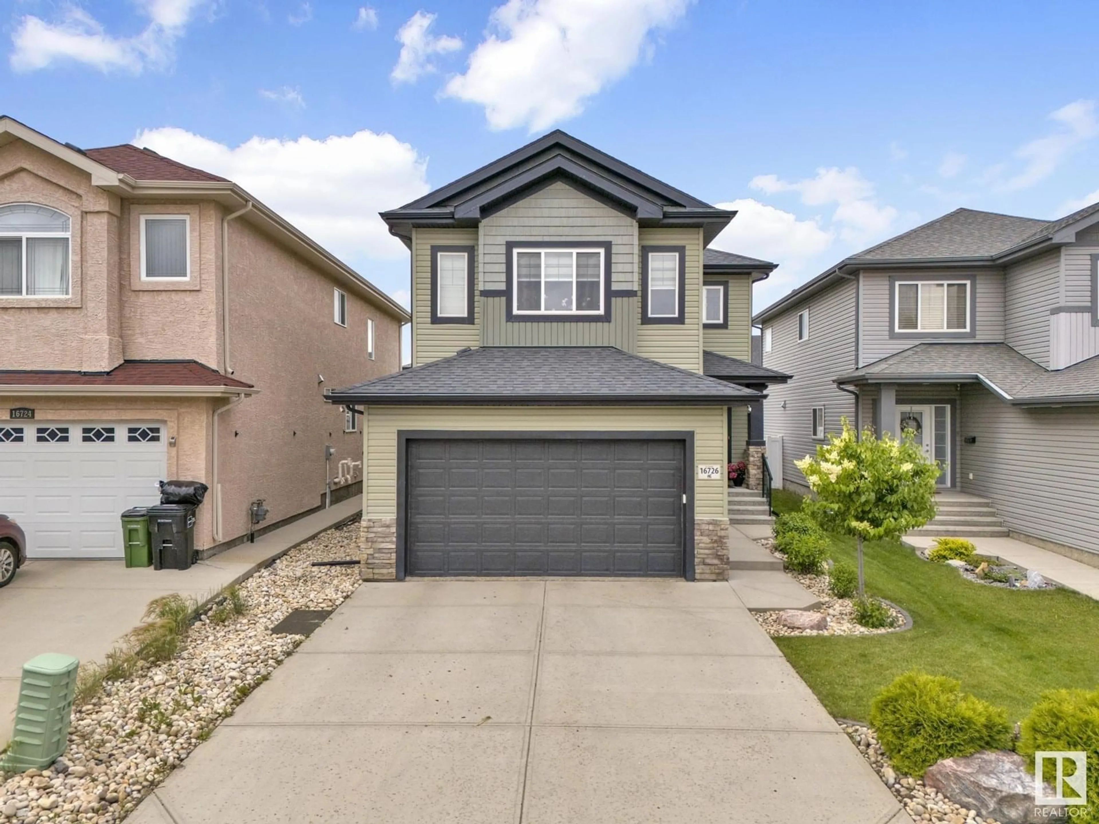 Home with vinyl exterior material, street for 16726 62 ST NW, Edmonton Alberta T5L0Z8