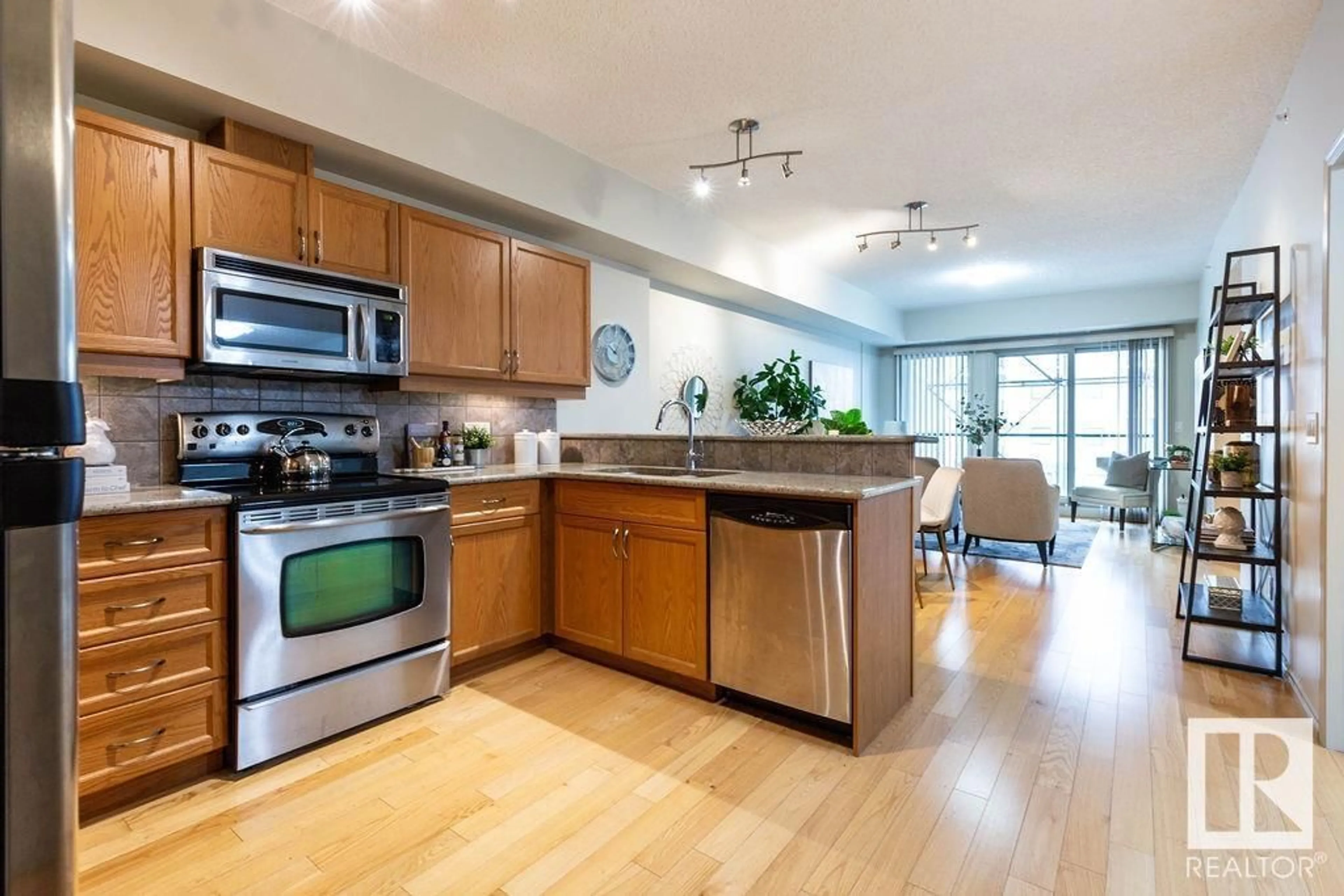 Open concept kitchen, wood/laminate floor for 301 - 10303 111 ST NW, Edmonton Alberta T5K0C6