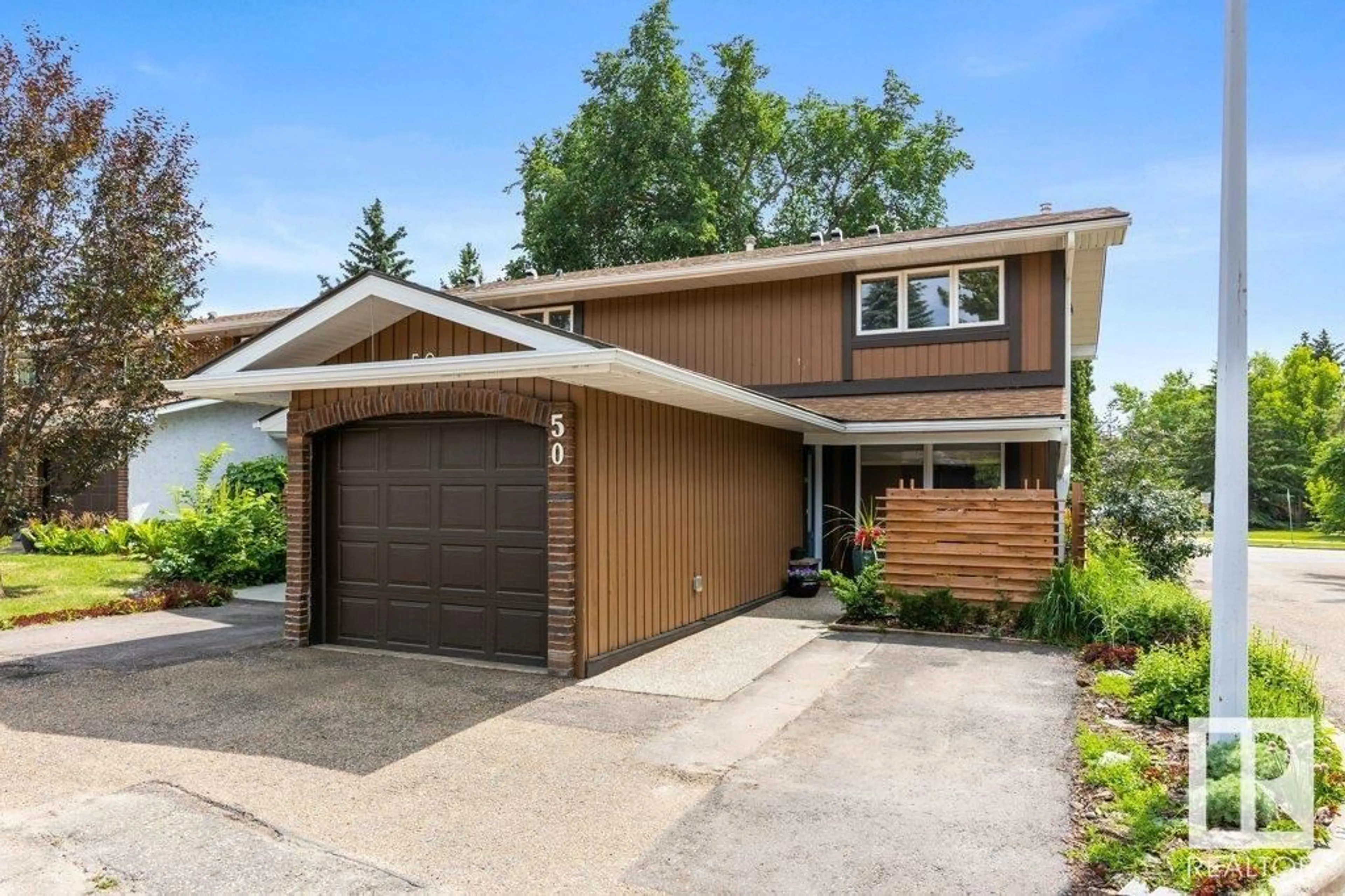 Home with vinyl exterior material, street for 50 HEARTHSTONE NW, Edmonton Alberta T6H5E5