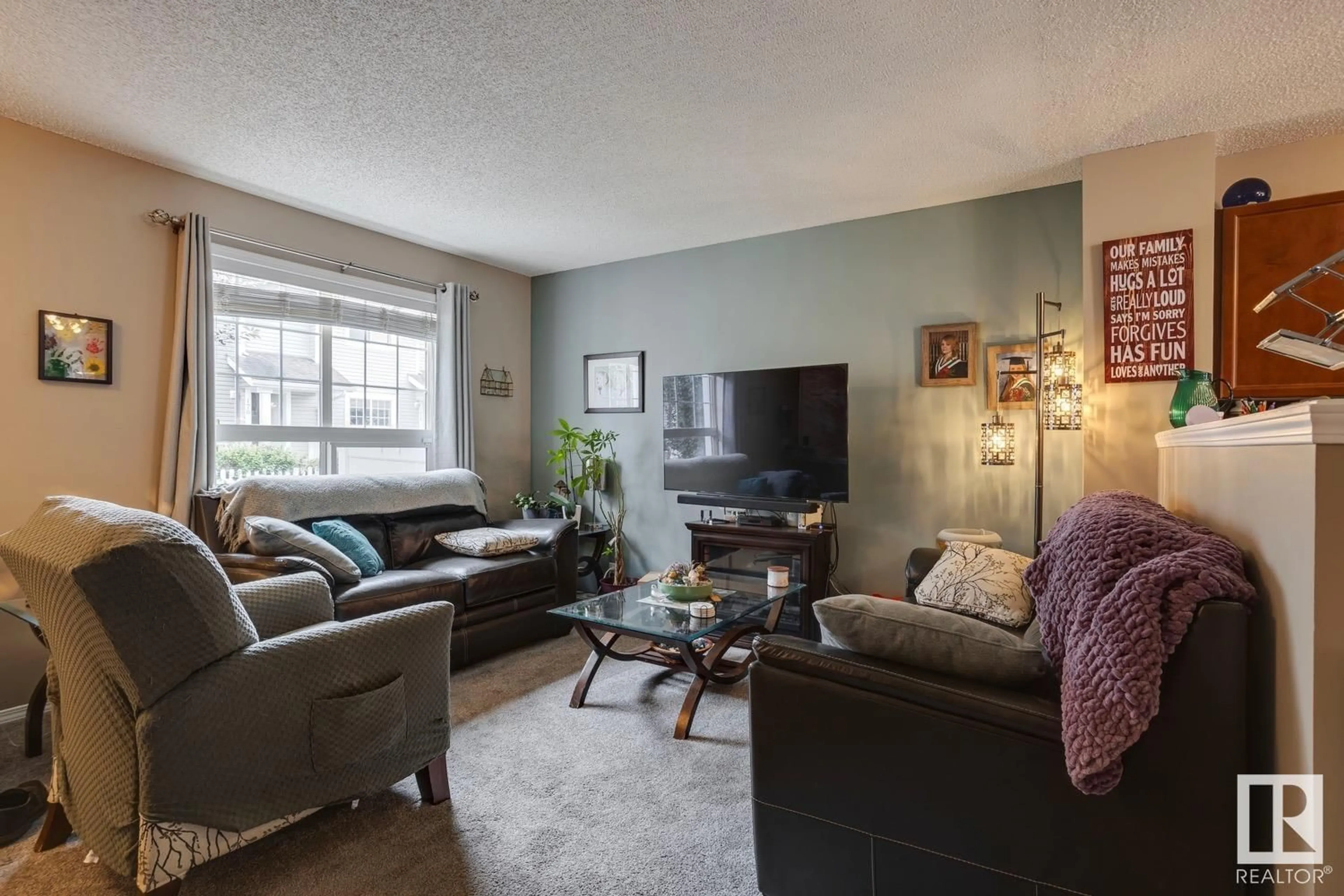 Living room with furniture, unknown for 165 - 5604 199 ST NW, Edmonton Alberta T6M2Z9