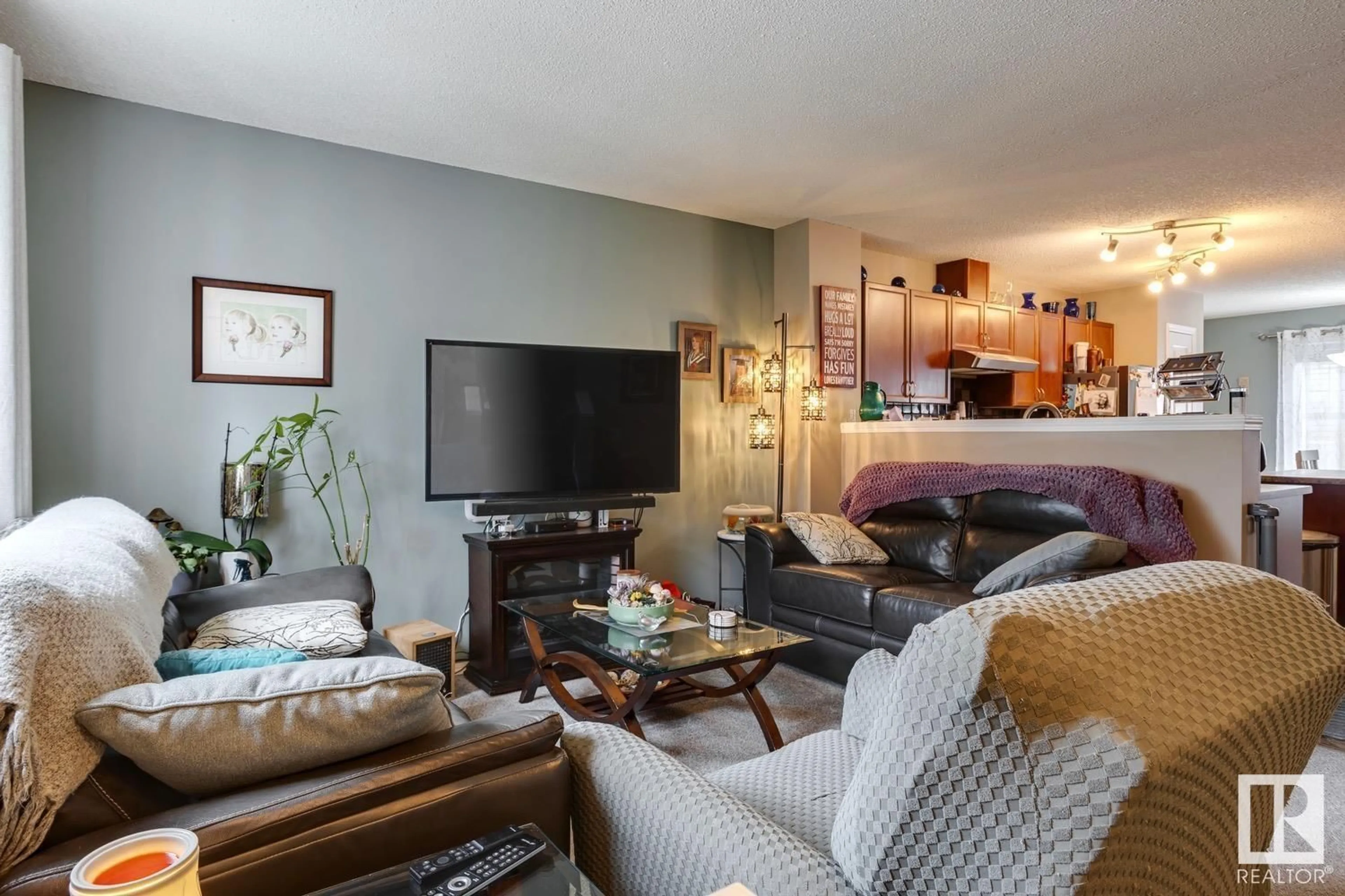 Living room with furniture, unknown for 165 - 5604 199 ST NW, Edmonton Alberta T6M2Z9