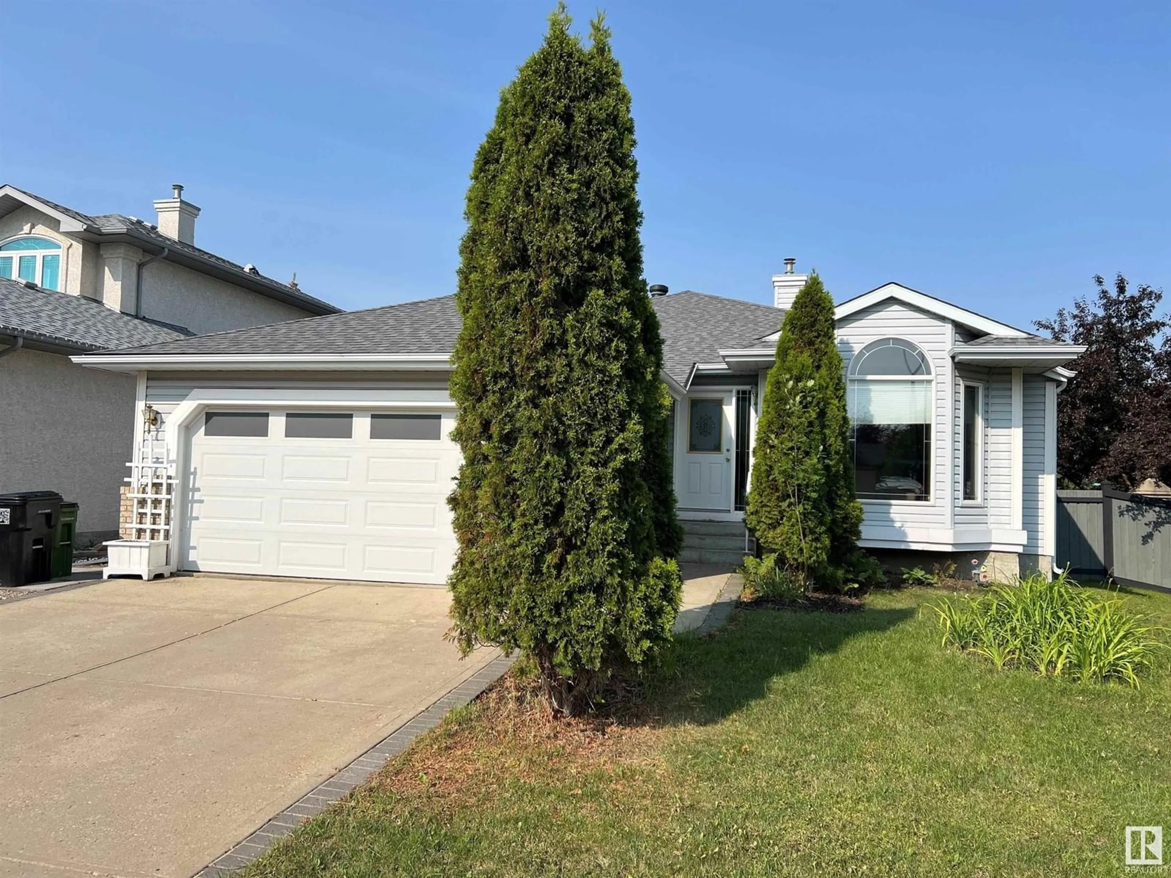 Home with vinyl exterior material, street for 1414 FALCONER RD, Edmonton Alberta T6R2P4