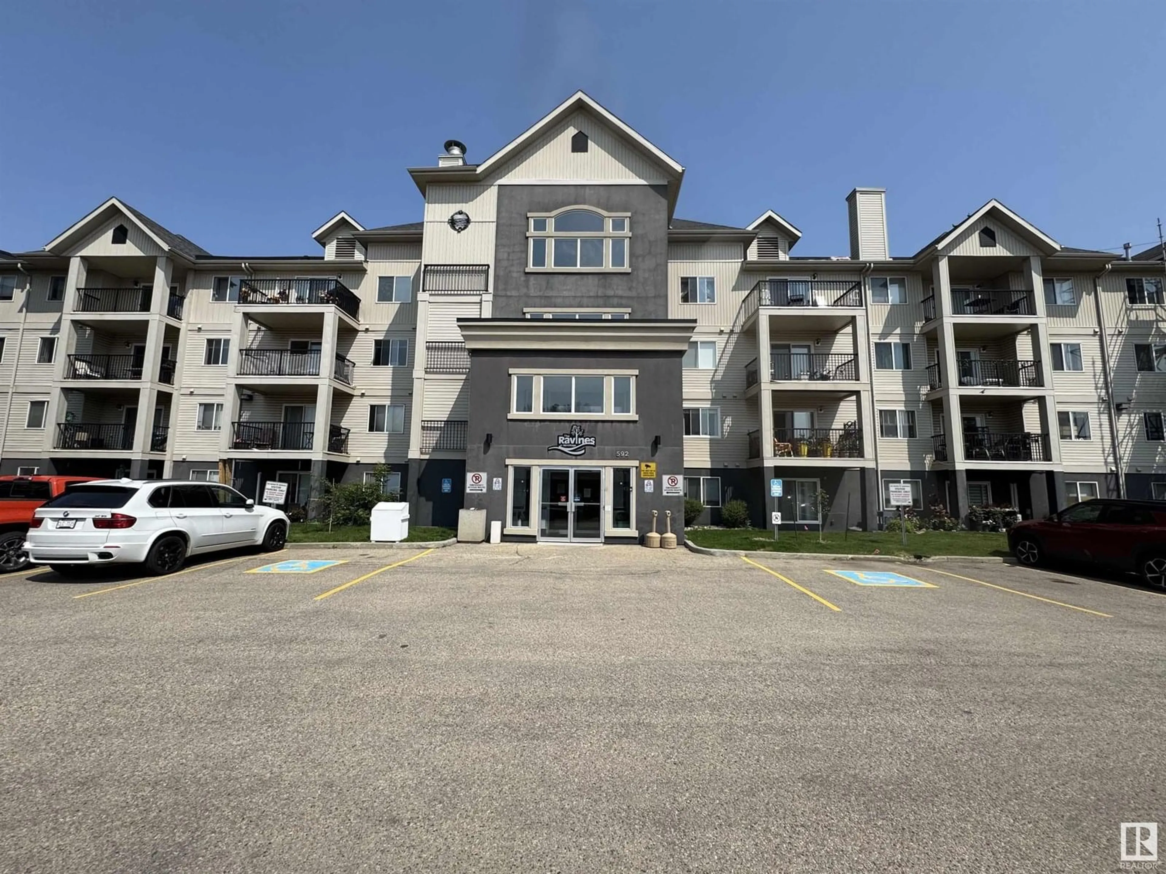 A pic from outside/outdoor area/front of a property/back of a property/a pic from drone, unknown for 592 - 131 HOOKE RD, Edmonton Alberta T5A5H2