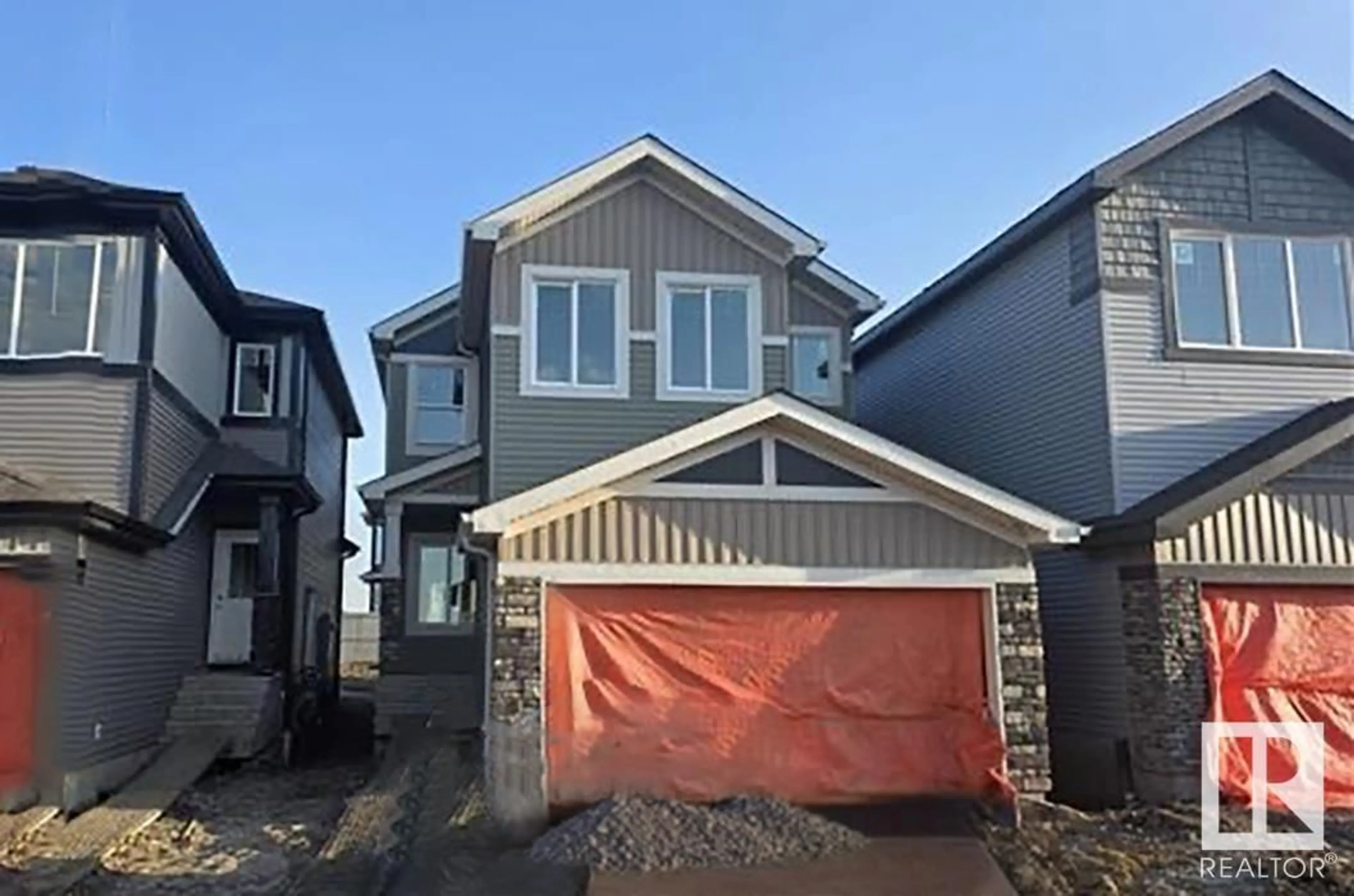 Home with vinyl exterior material, street for 8607 181 AV, Edmonton Alberta T5Z0X1