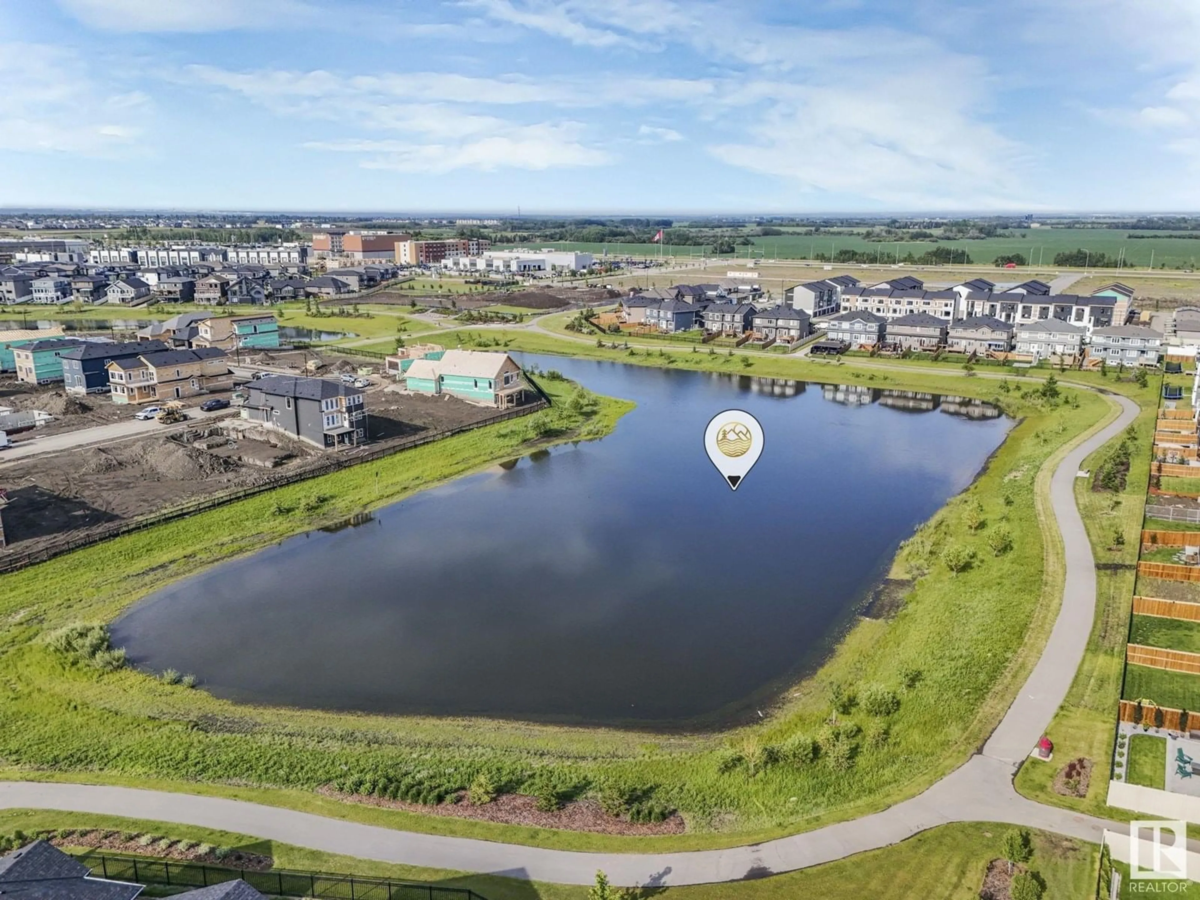 A pic from outside/outdoor area/front of a property/back of a property/a pic from drone, water/lake/river/ocean view for 100 EDGEFIELD WY, St. Albert Alberta T6T1R8