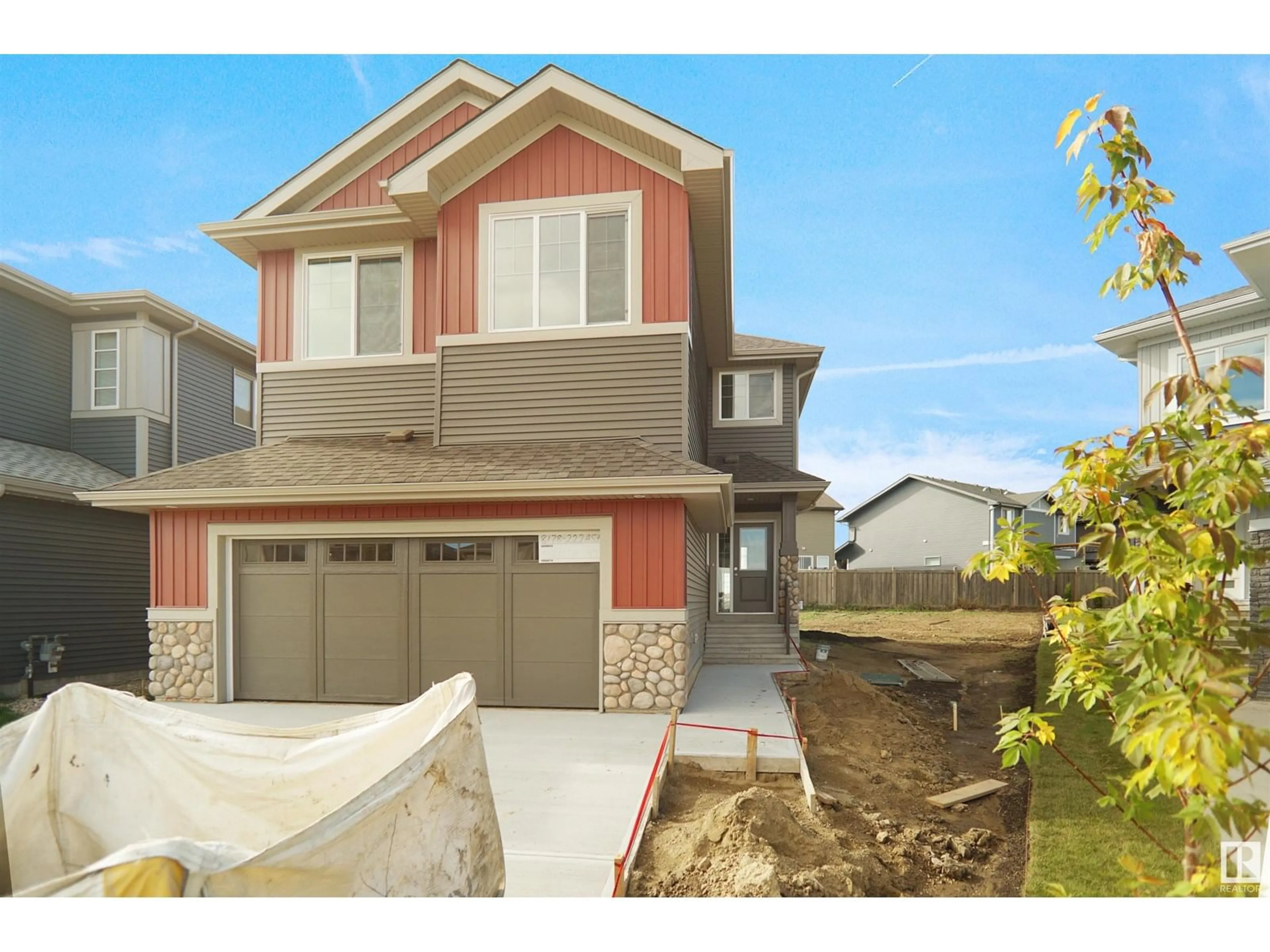 Home with vinyl exterior material, street for NE - 17340 7 ST, Edmonton Alberta T5Y4E7