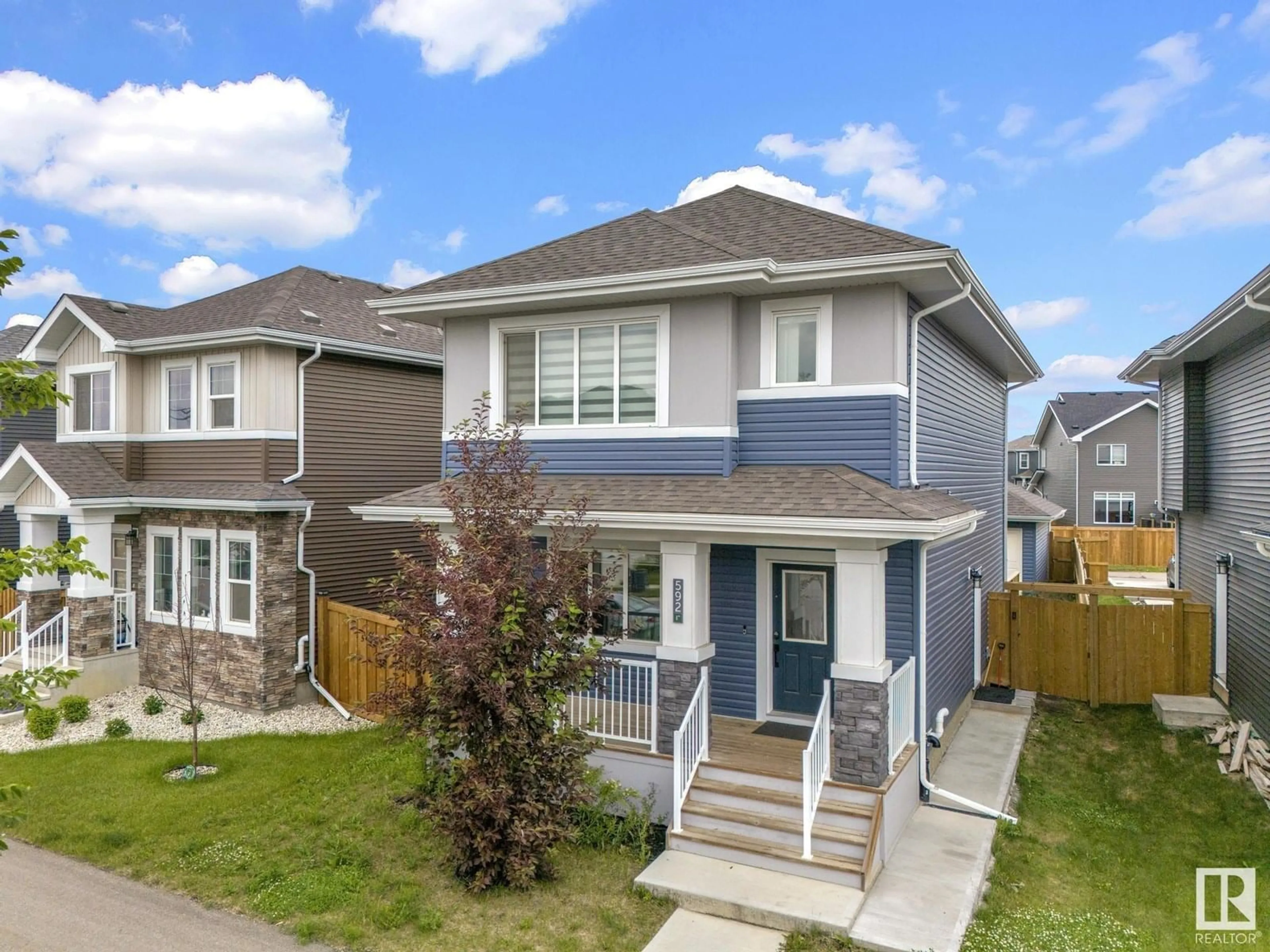 A pic from outside/outdoor area/front of a property/back of a property/a pic from drone, street for 592 GLENRIDDING RAVINE DR, Edmonton Alberta T6W4N9