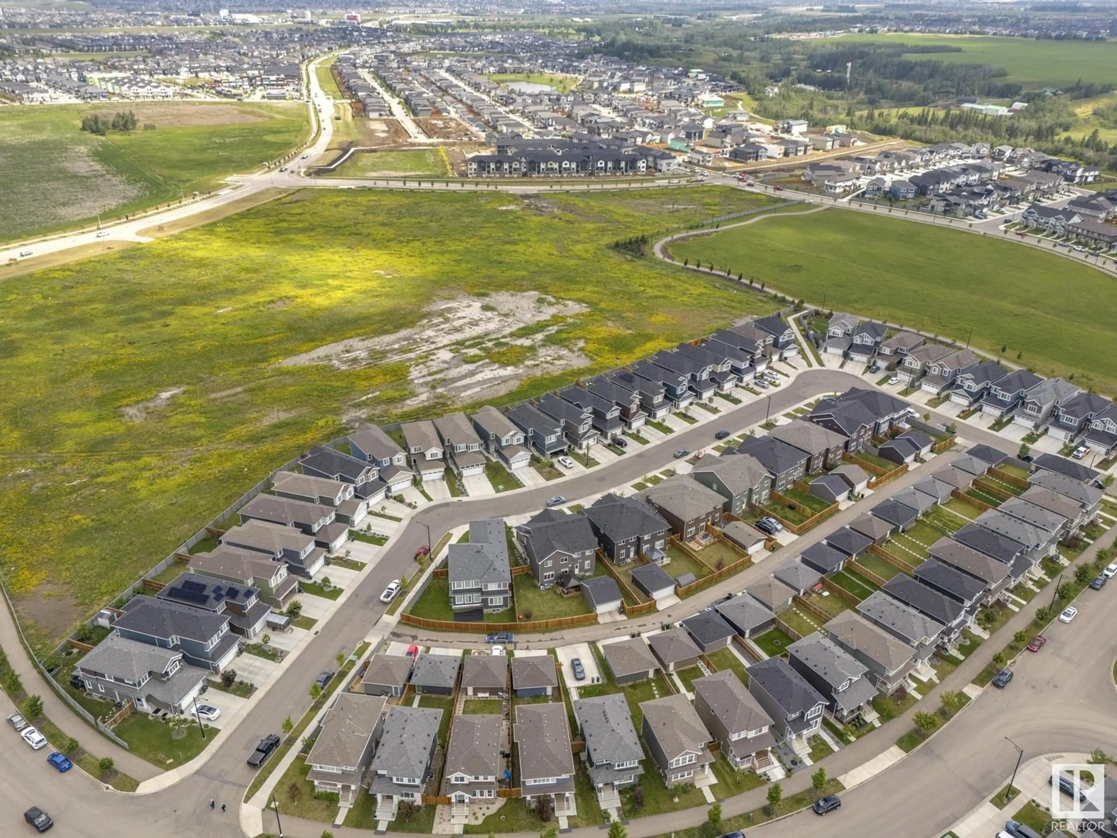 A pic from outside/outdoor area/front of a property/back of a property/a pic from drone, street for 592 GLENRIDDING RAVINE DR, Edmonton Alberta T6W4N9