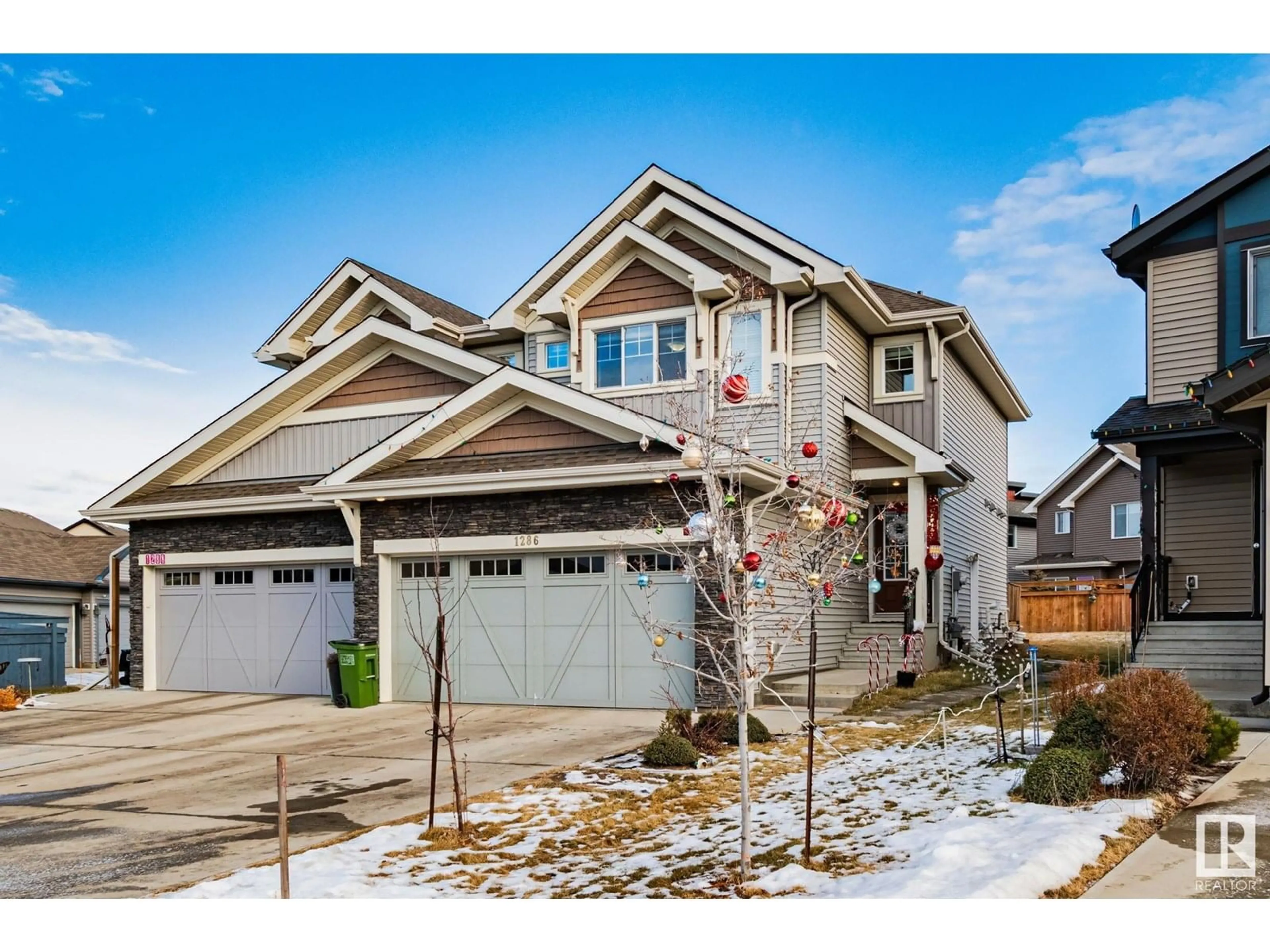 Home with vinyl exterior material, street for 1286 DANIELS CR, Edmonton Alberta T6W3J1