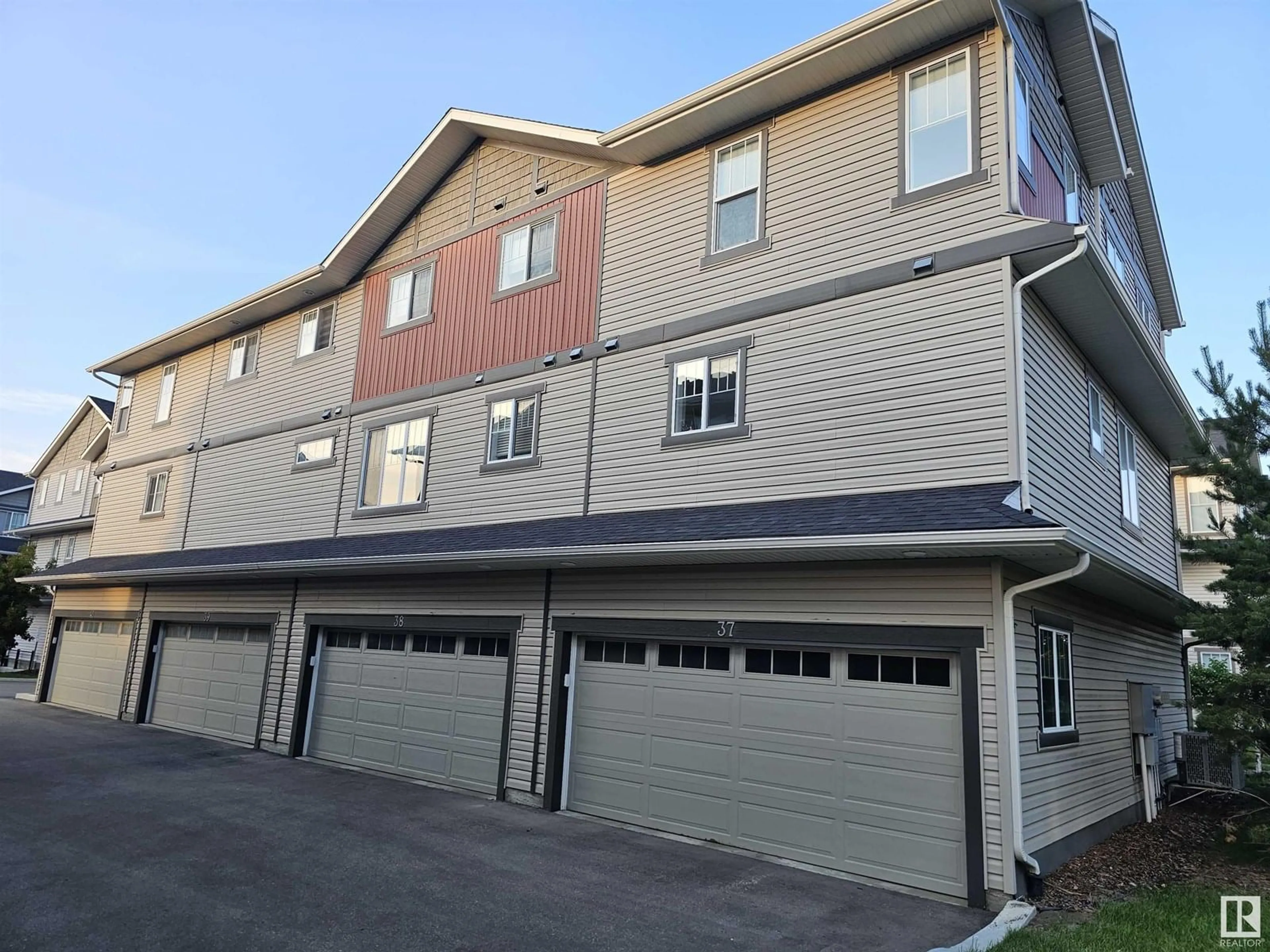 Home with vinyl exterior material, street for 12815 NW - 38 CUMBERLAND RD, Edmonton Alberta T6V0M2