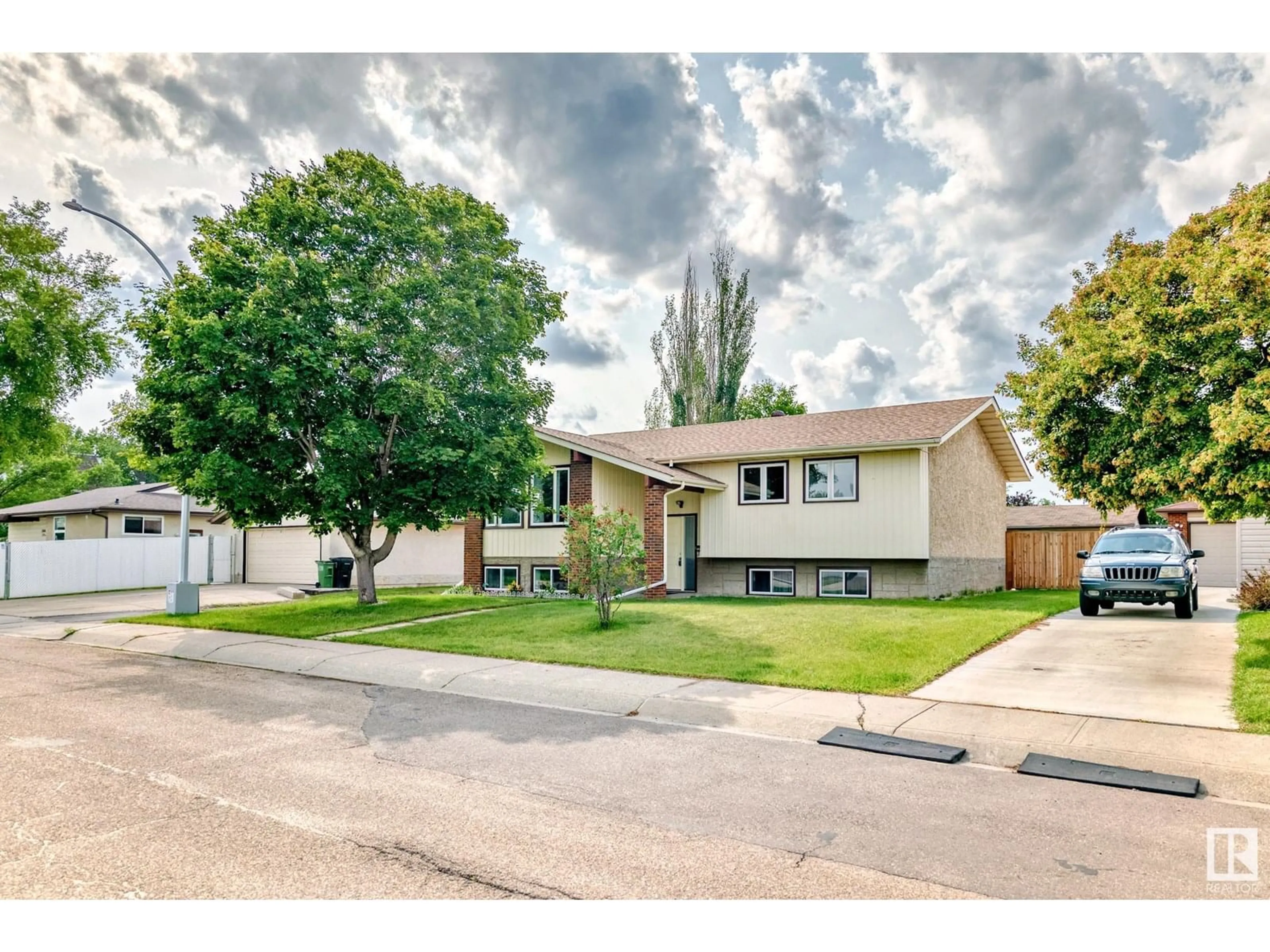 Home with vinyl exterior material, street for NW - 13908 120 ST, Edmonton Alberta T5X4X8