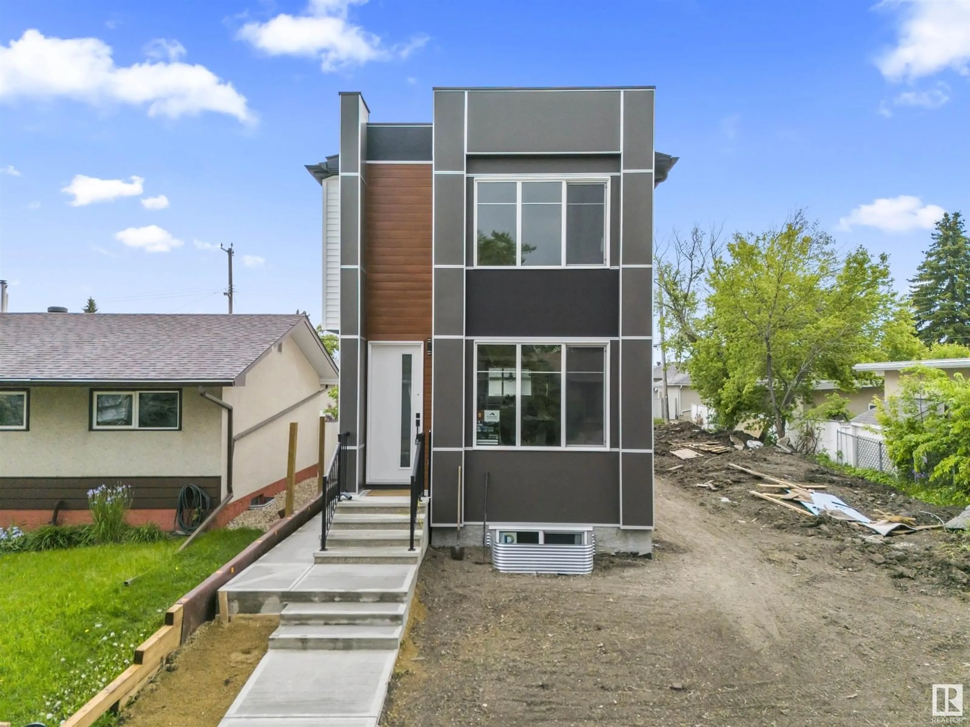 Home with vinyl exterior material, street for NW - 4725 105B ST, Edmonton Alberta T6H2R7