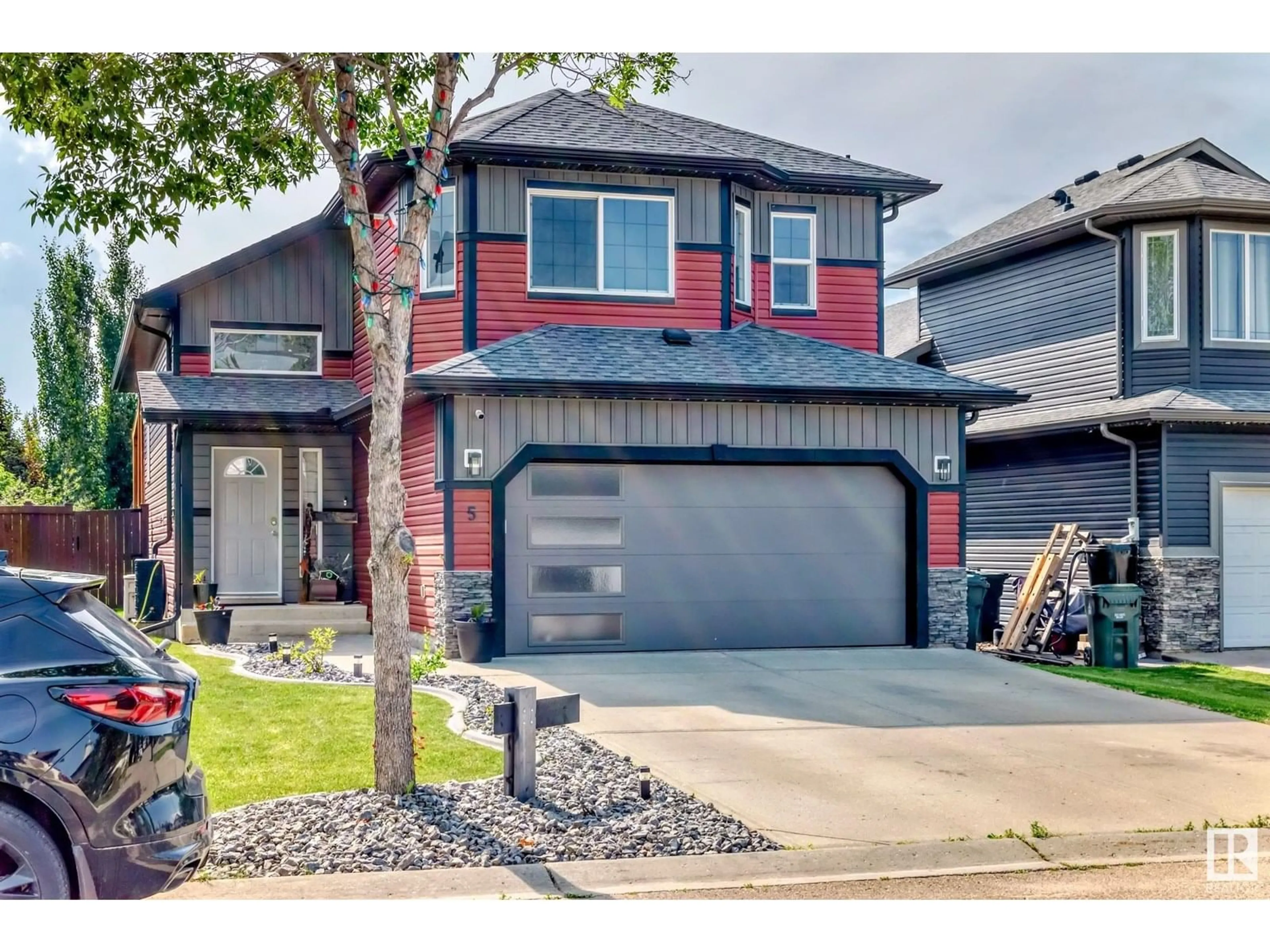 Home with vinyl exterior material, street for 5 LAMPLIGHT CV, Spruce Grove Alberta T7X4R2