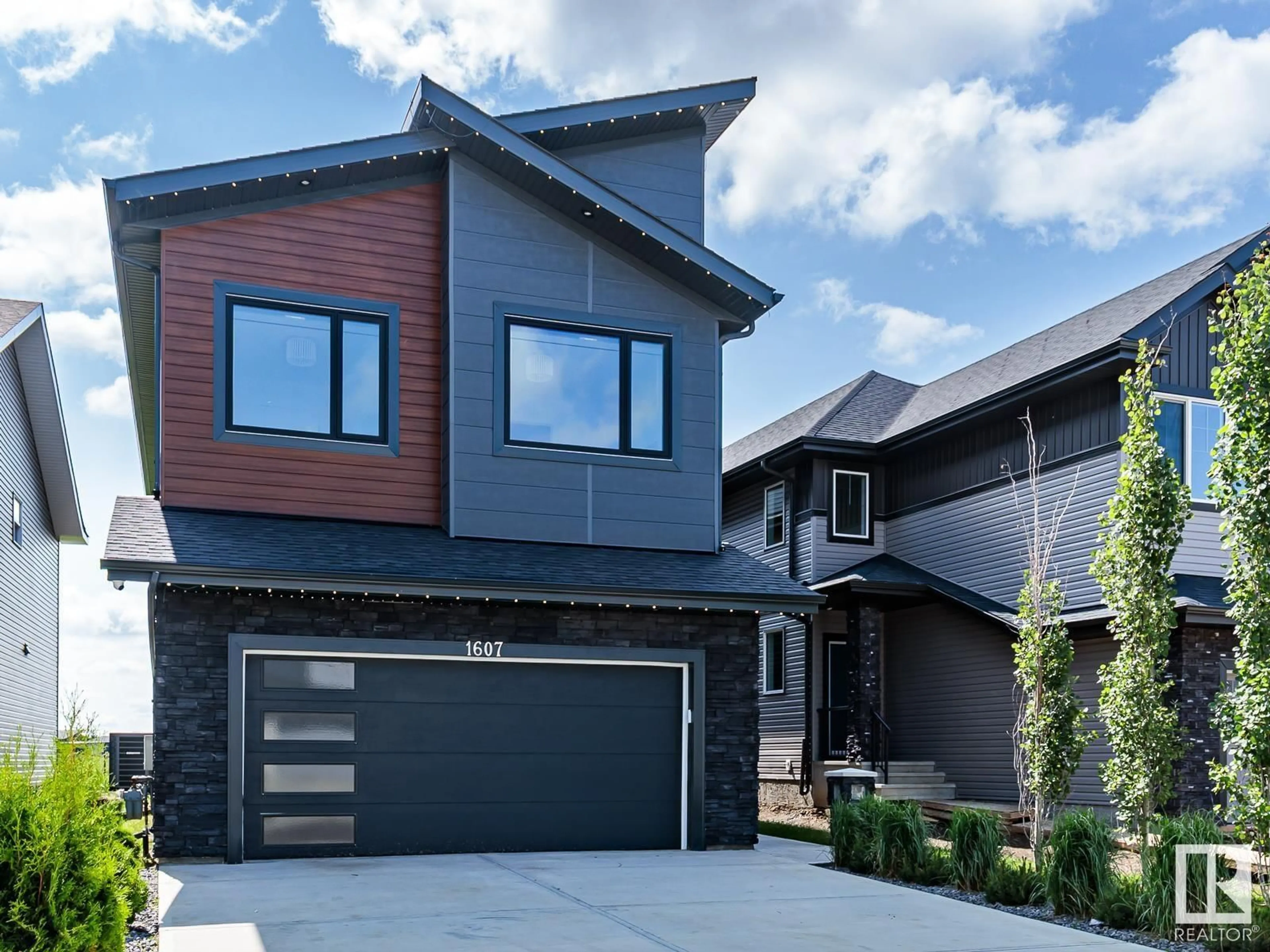 Home with brick exterior material, street for SW - 1607 157 ST, Edmonton Alberta T6W4J8