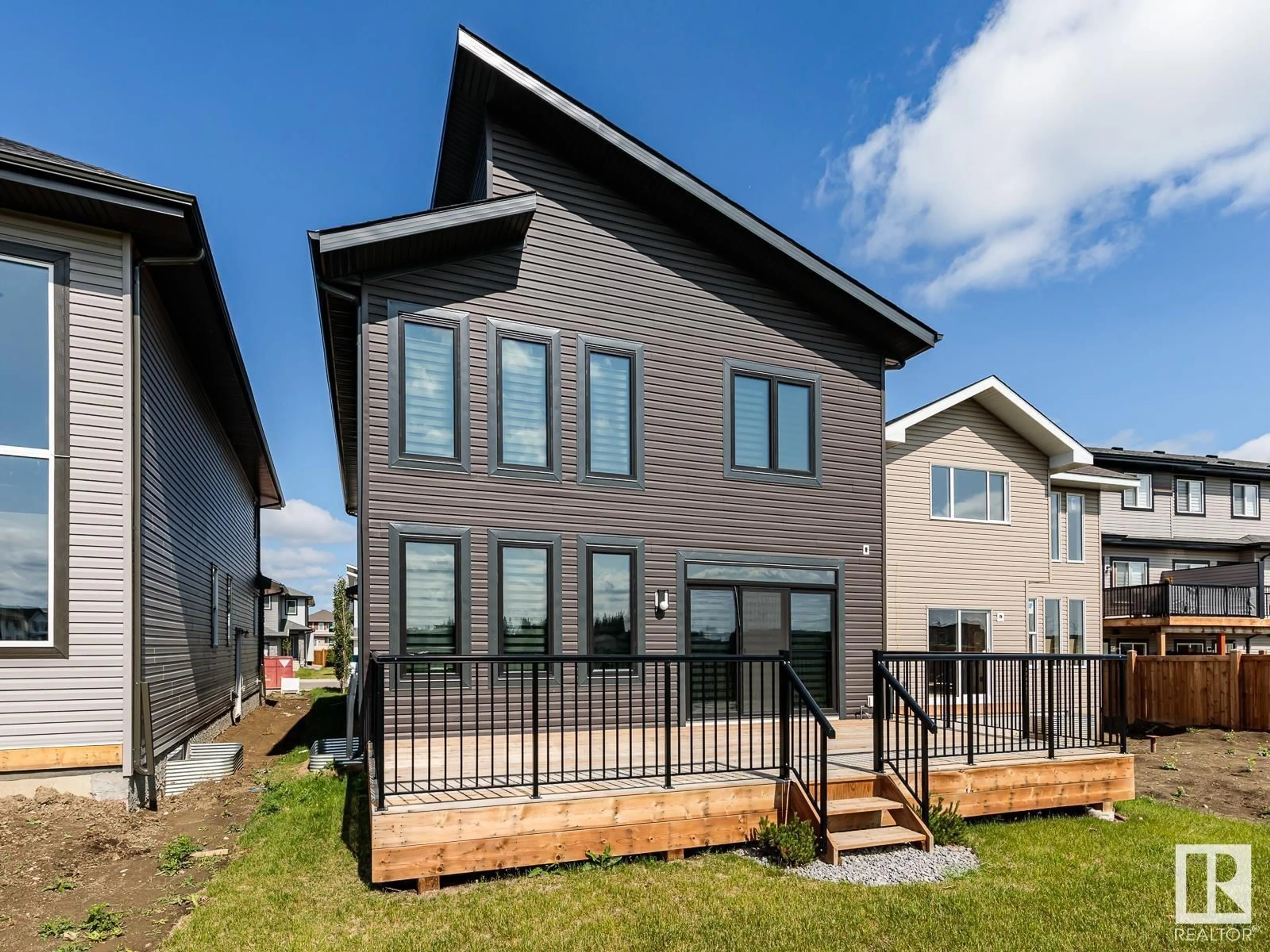 Home with vinyl exterior material, street for SW - 1607 157 ST, Edmonton Alberta T6W4J8