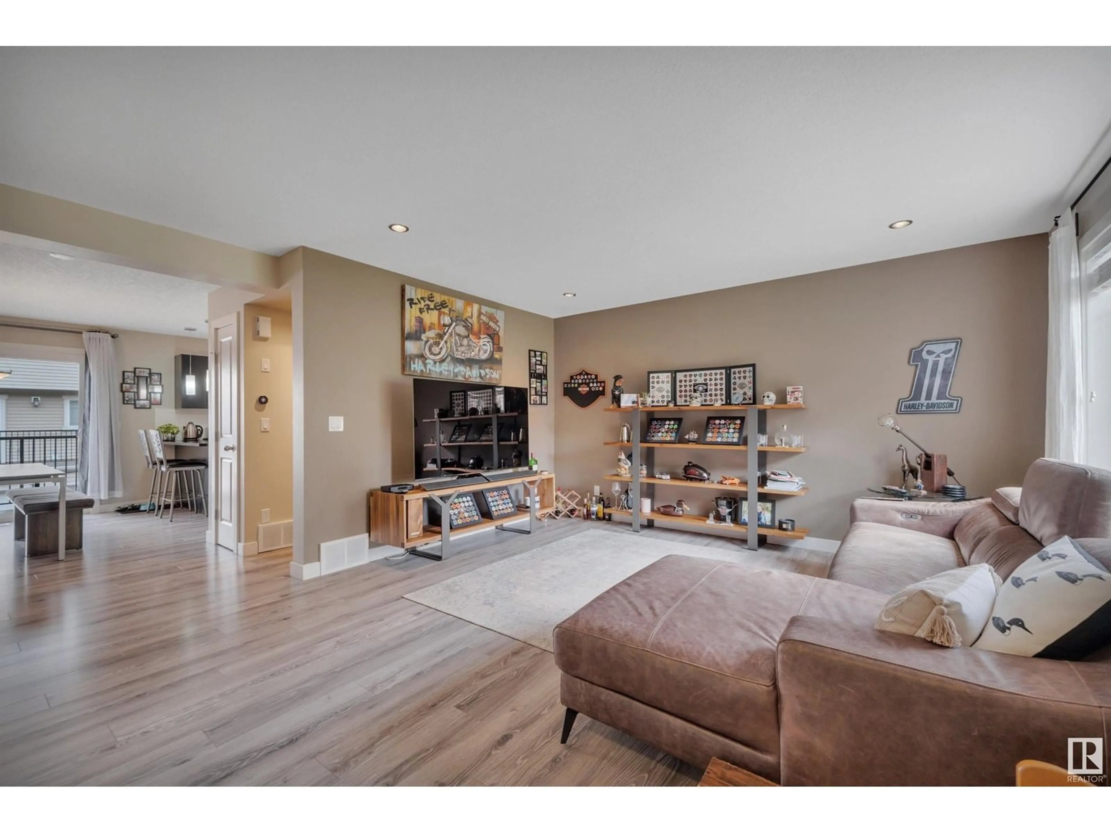 Living room with furniture, wood/laminate floor for #12 - 7289 SOUTH TERWILLEGAR DR, Edmonton Alberta T6R0N5