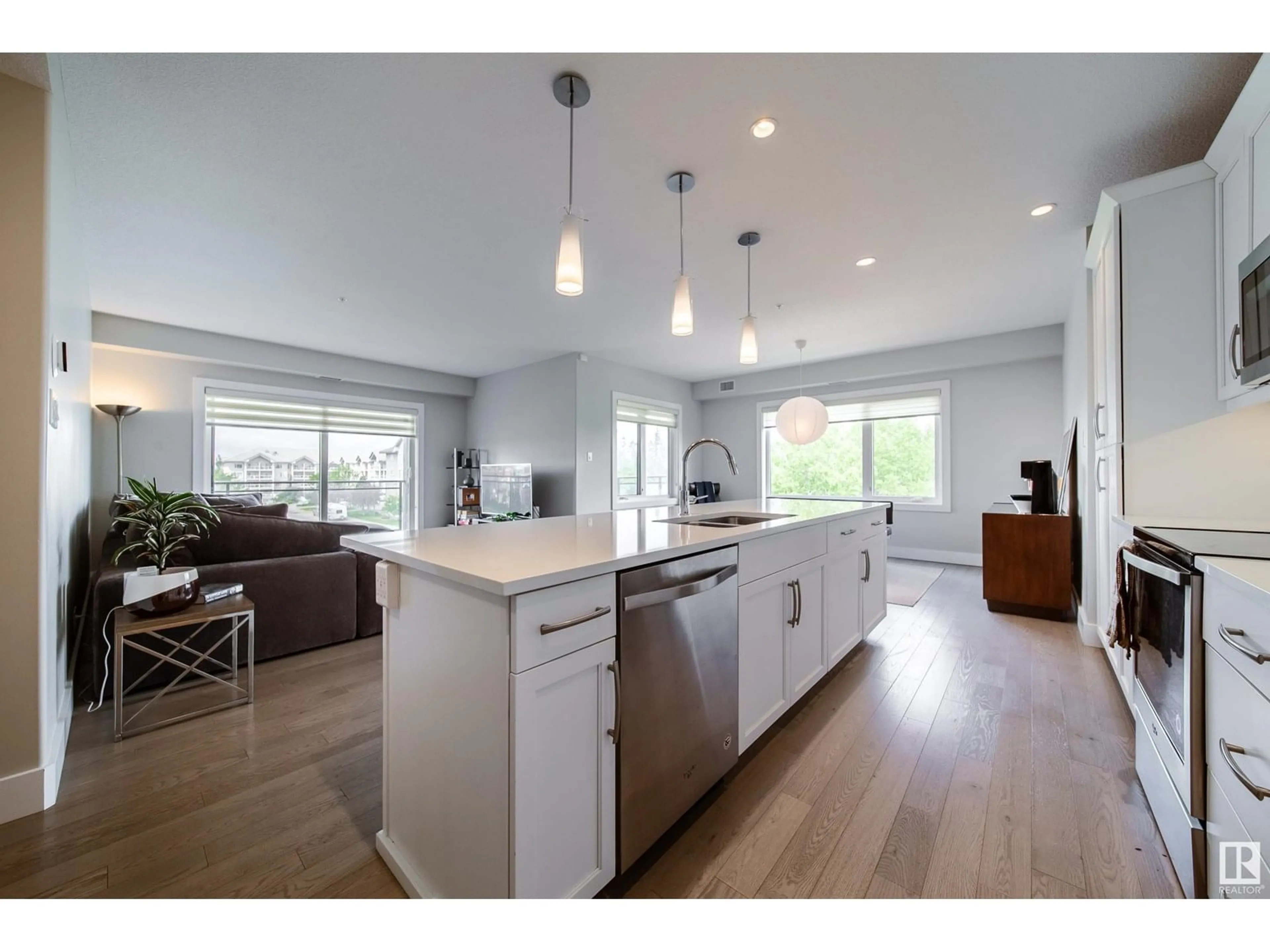 Open concept kitchen, wood/laminate floor for #327 - 11074 ELLERSLIE RD, Edmonton Alberta T6W2C2