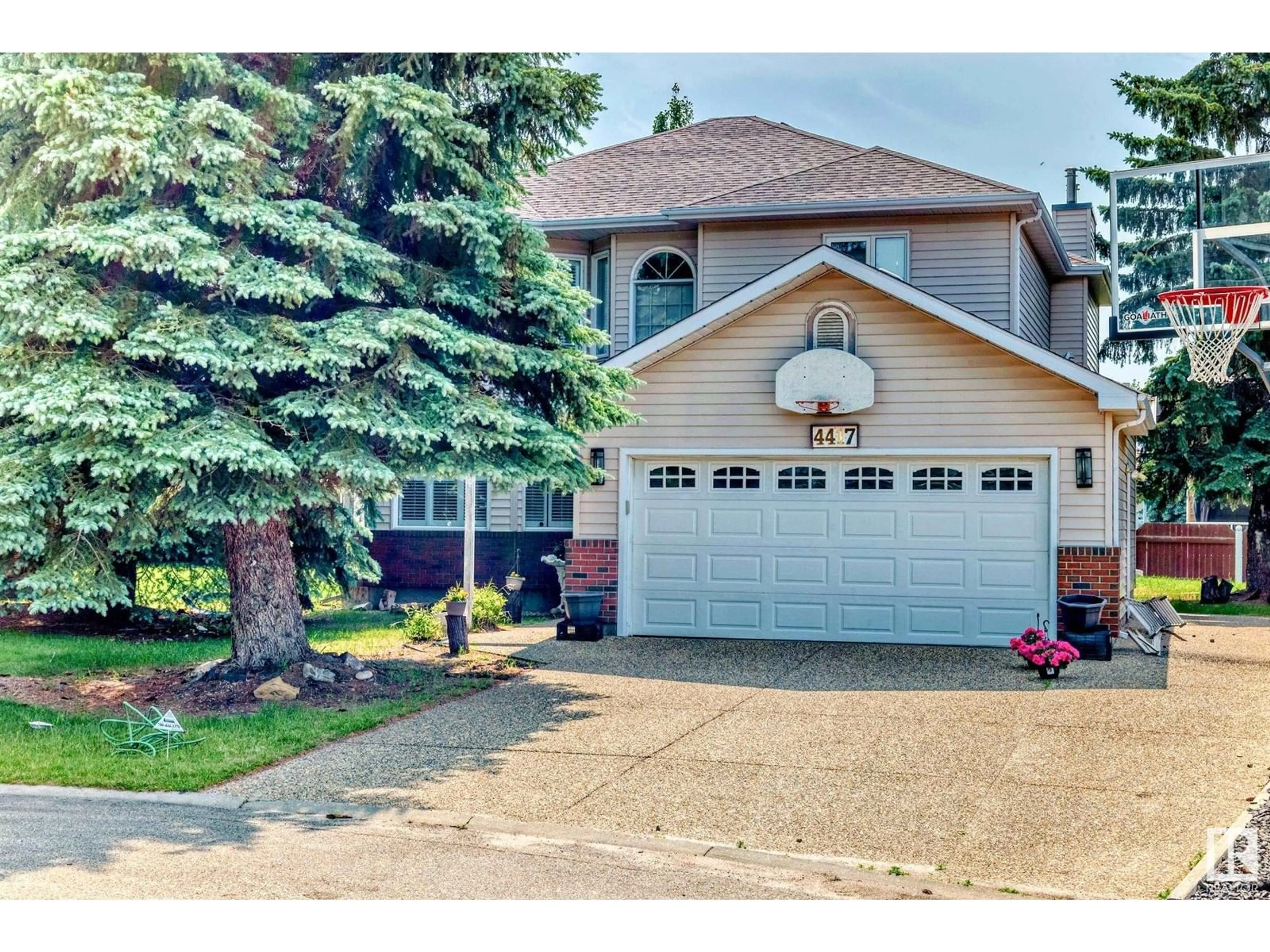 Home with vinyl exterior material, street for 4417 33 ST, Edmonton Alberta T6T1E9