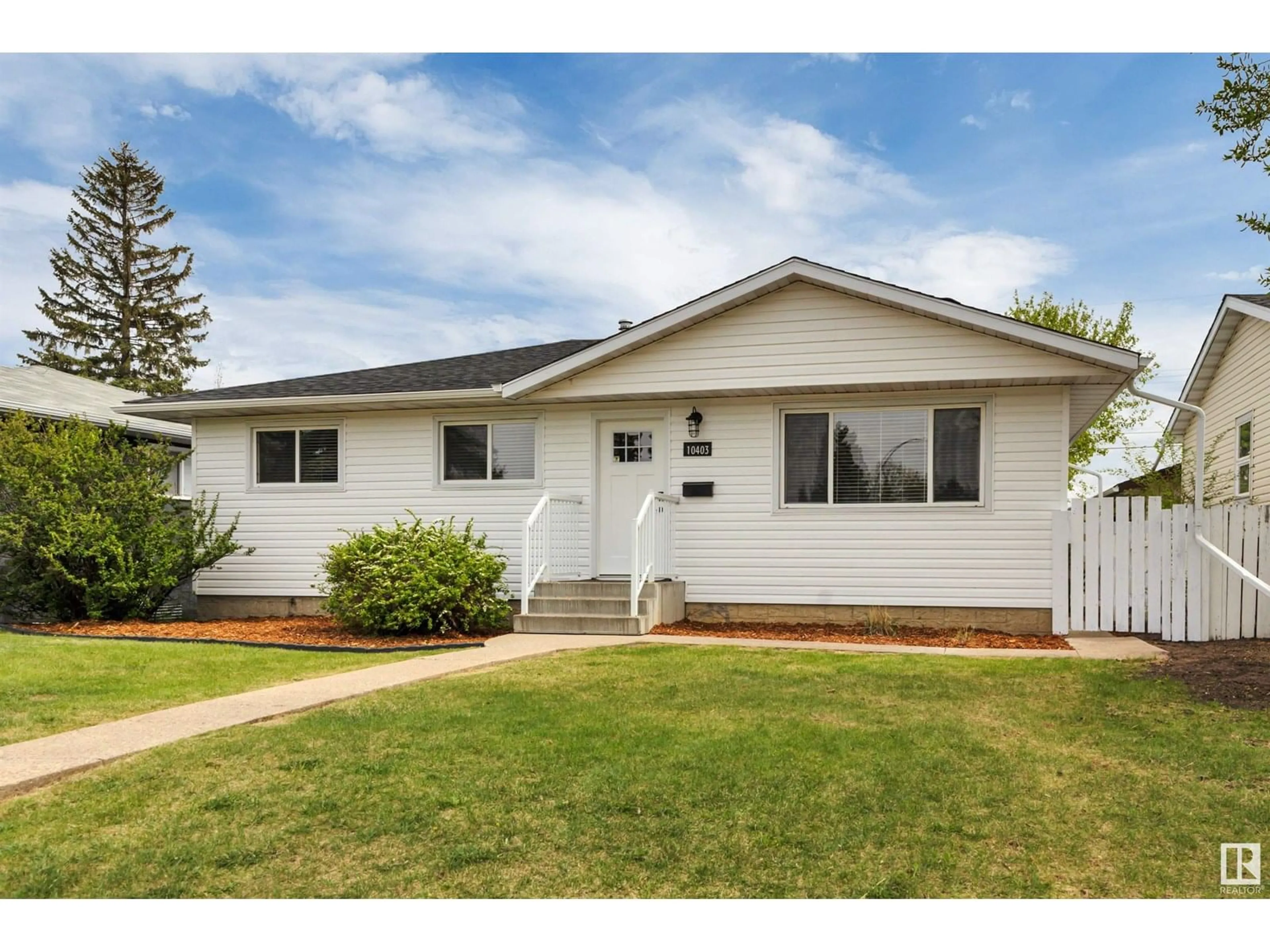 Home with vinyl exterior material, street for NW - 10403 42 ST, Edmonton Alberta T6A1T3